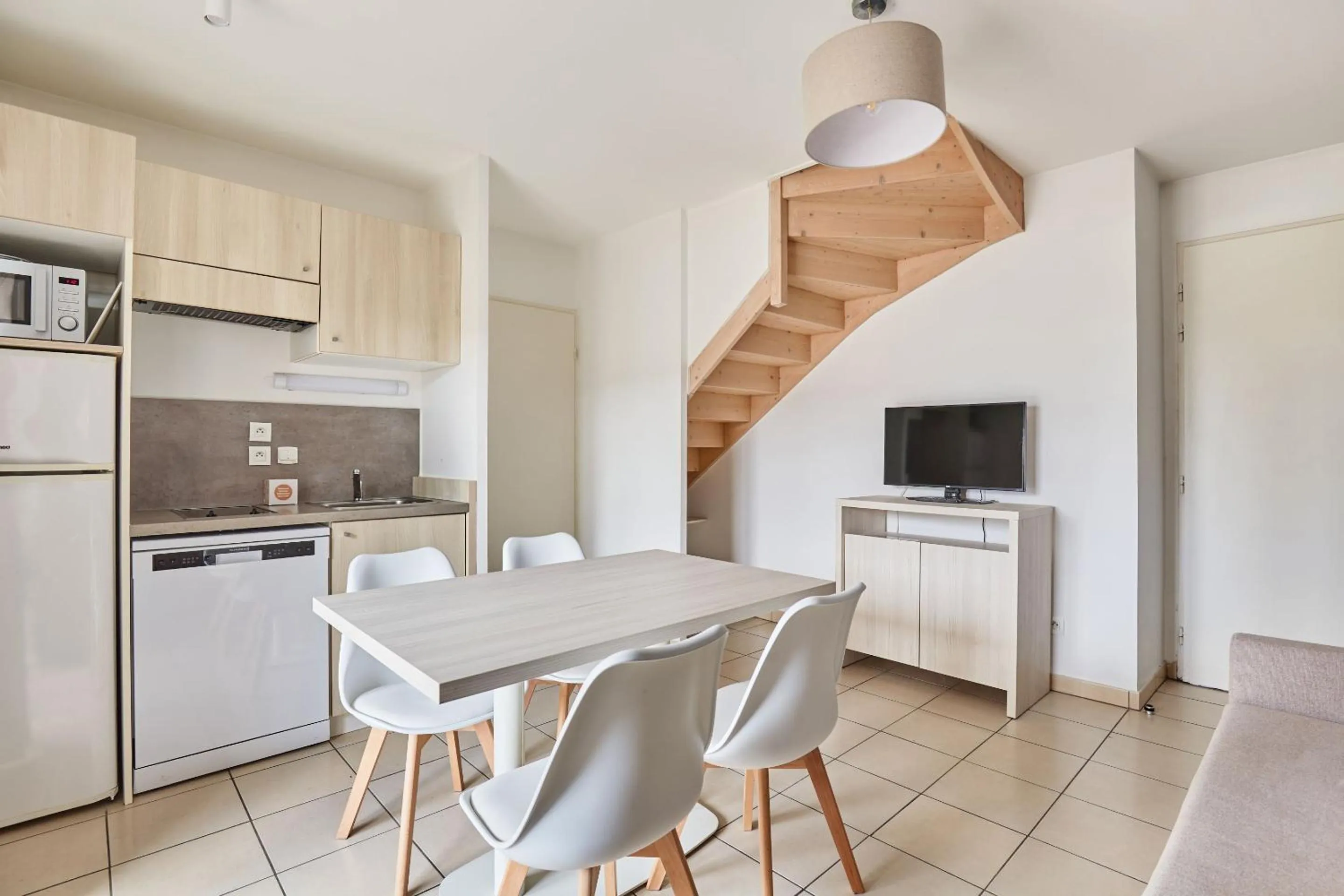 Dining area in Résidence Odalys Le Mas des Flamants