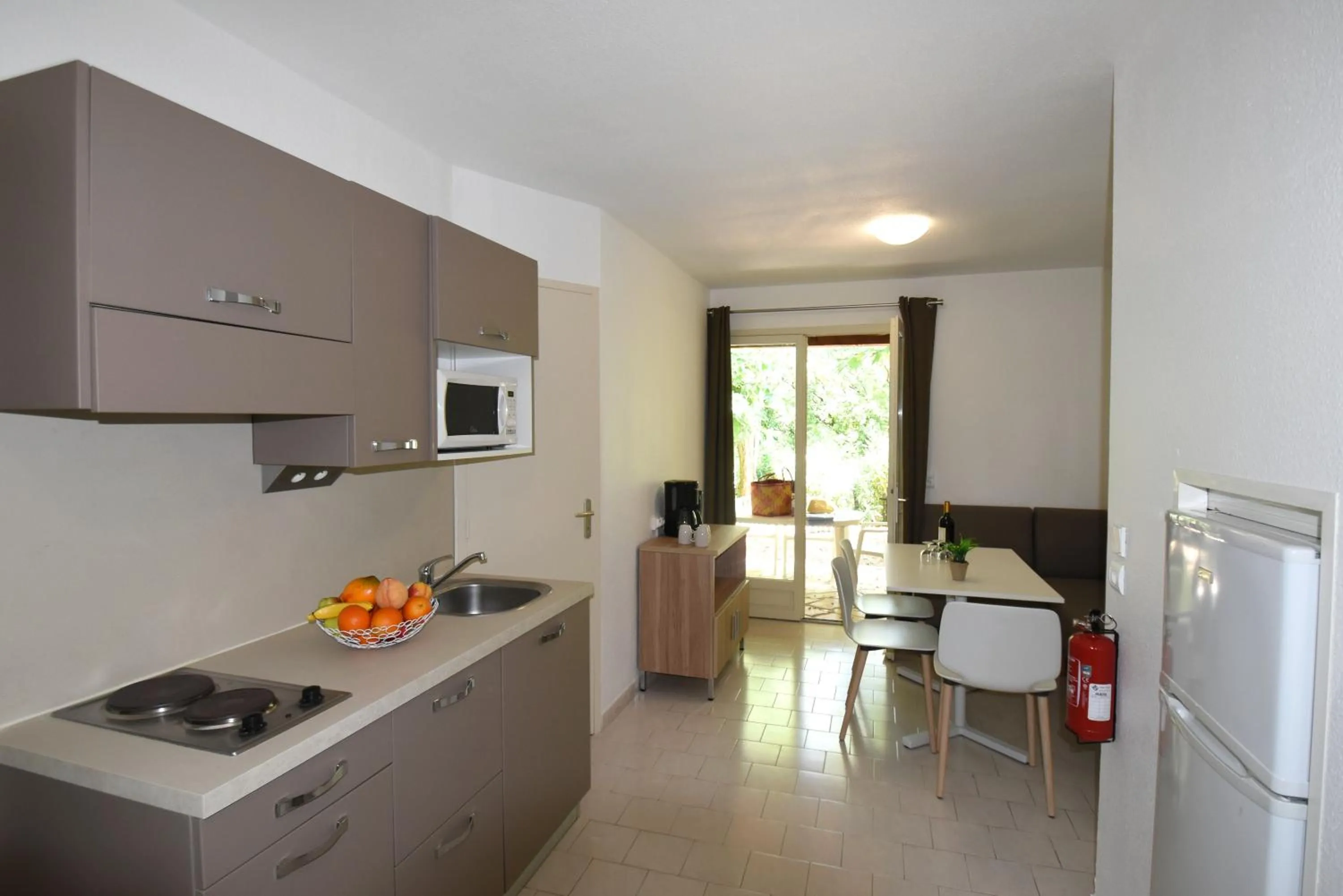 Kitchen or kitchenette in Residence La Palmeraie