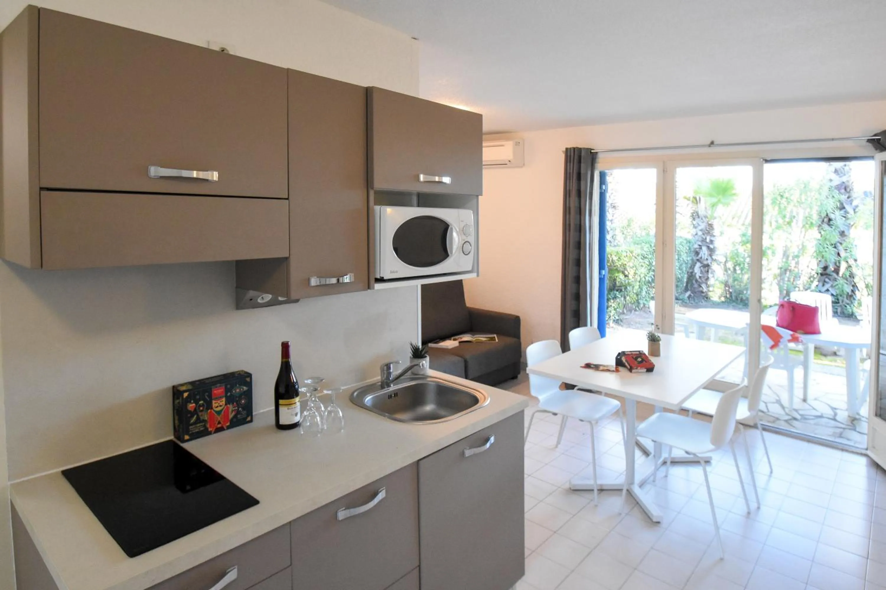 Kitchen or kitchenette in Residence La Palmeraie