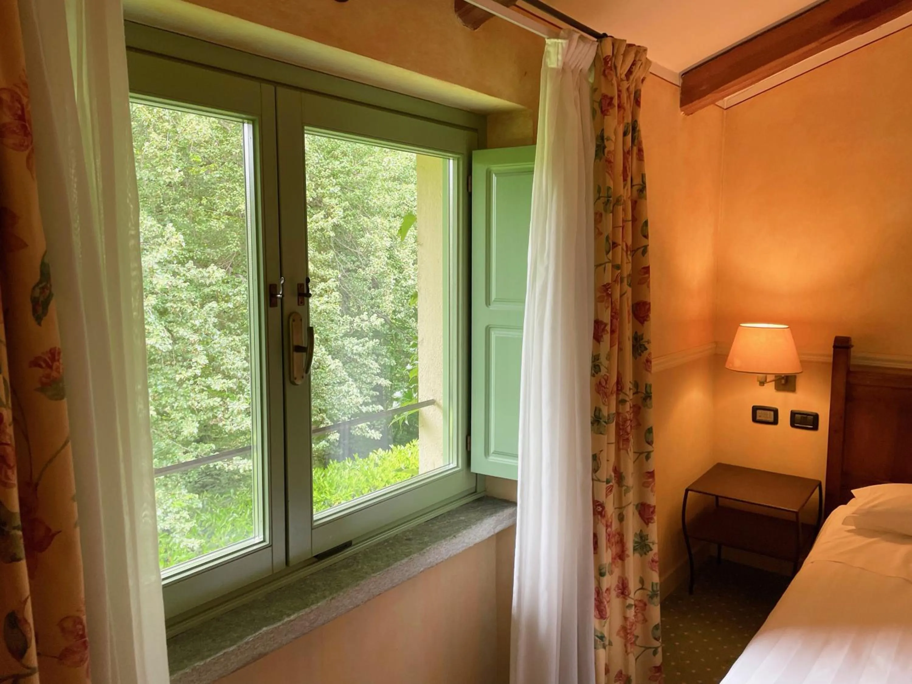 Bed in Locanda Maison Verte