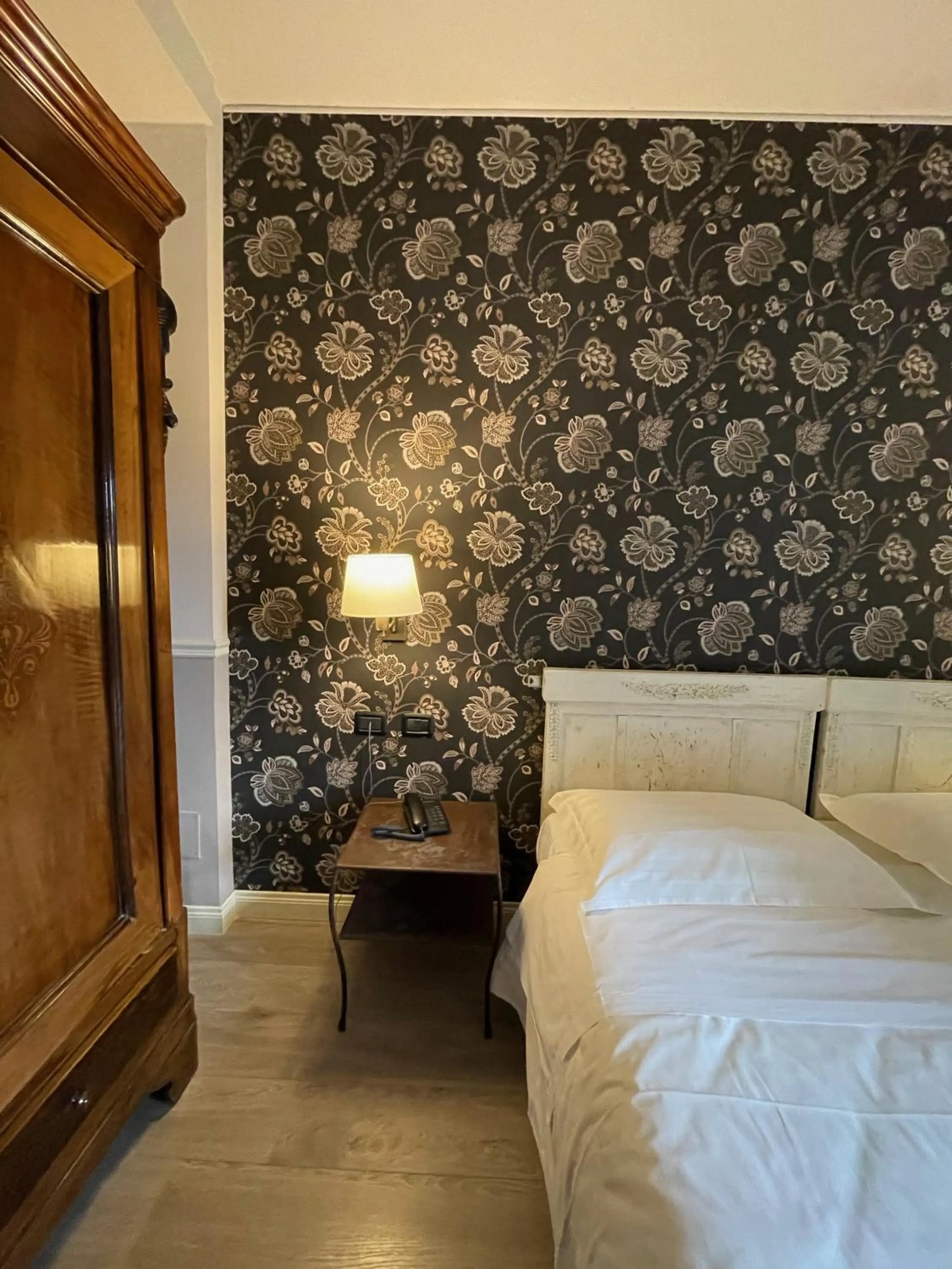 Bed in Locanda Maison Verte