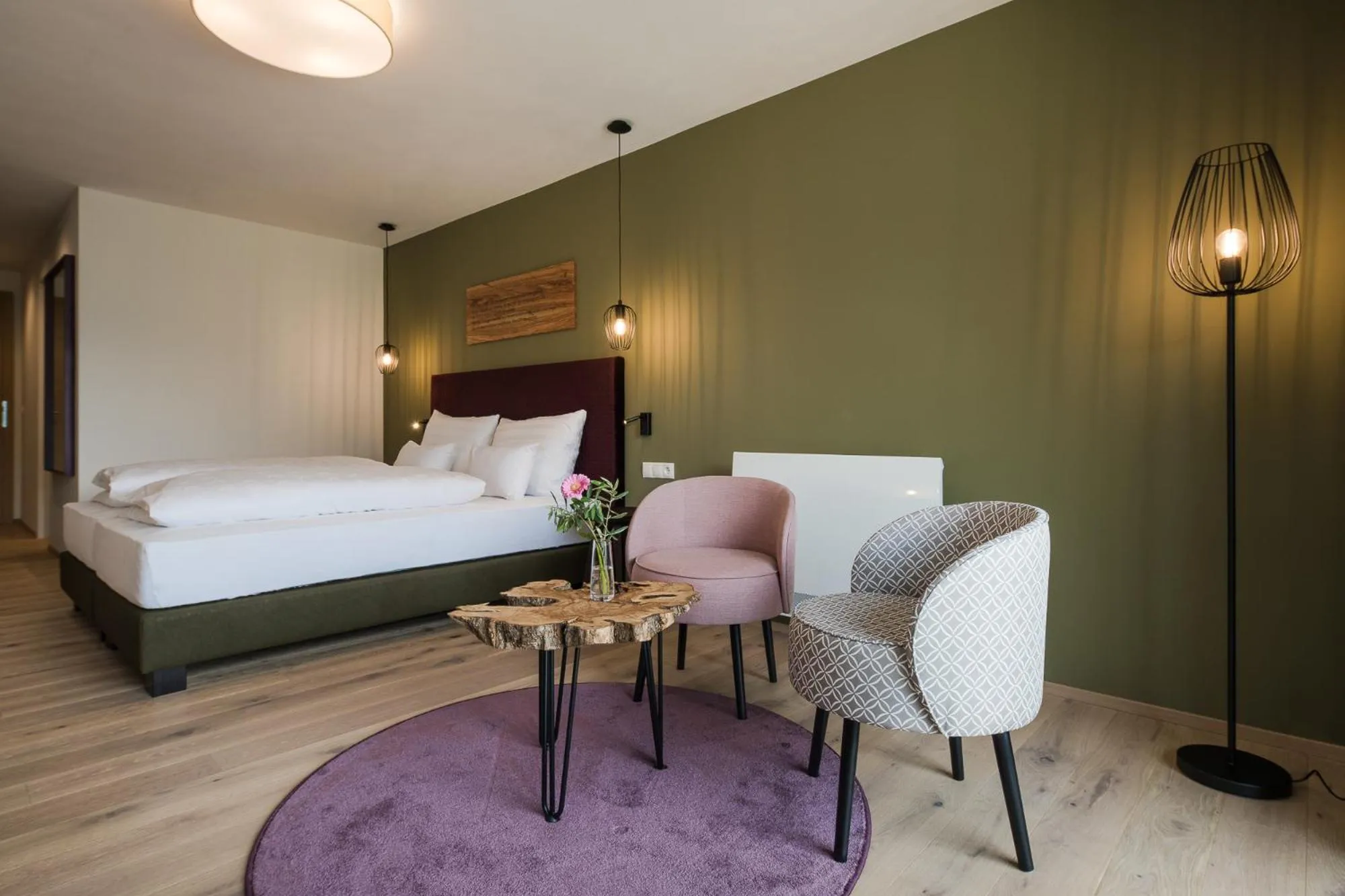 Bed in Oliven- & Genusshotel Hirzer