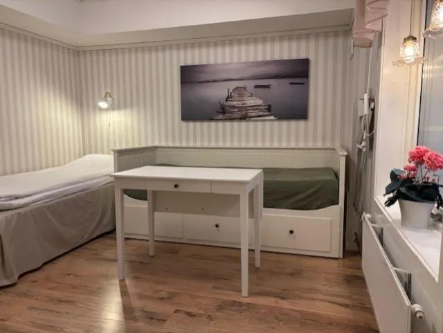 Bed in Sörnäsgården Bed & Breakfast