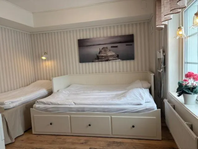 Bed in Sörnäsgården Bed & Breakfast