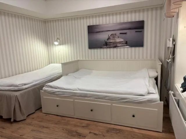 Bed in Sörnäsgården Bed & Breakfast