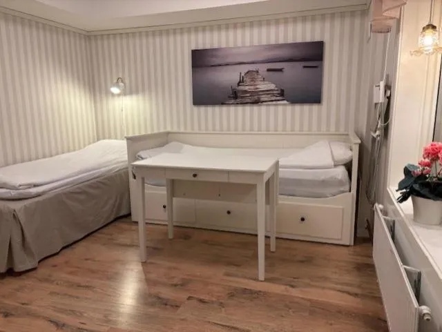Bed in Sörnäsgården Bed & Breakfast