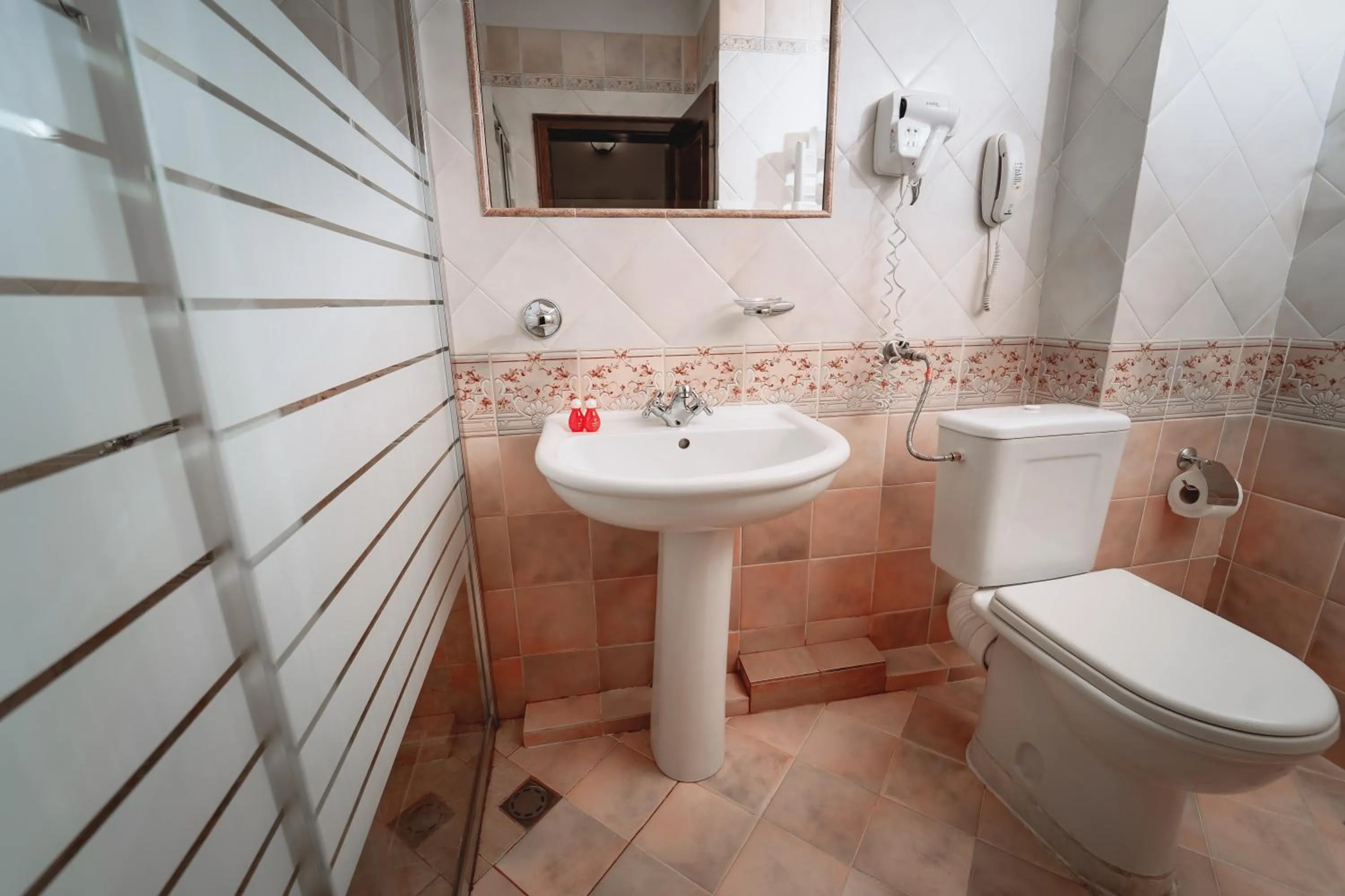 Bathroom in Hotel Winpalace