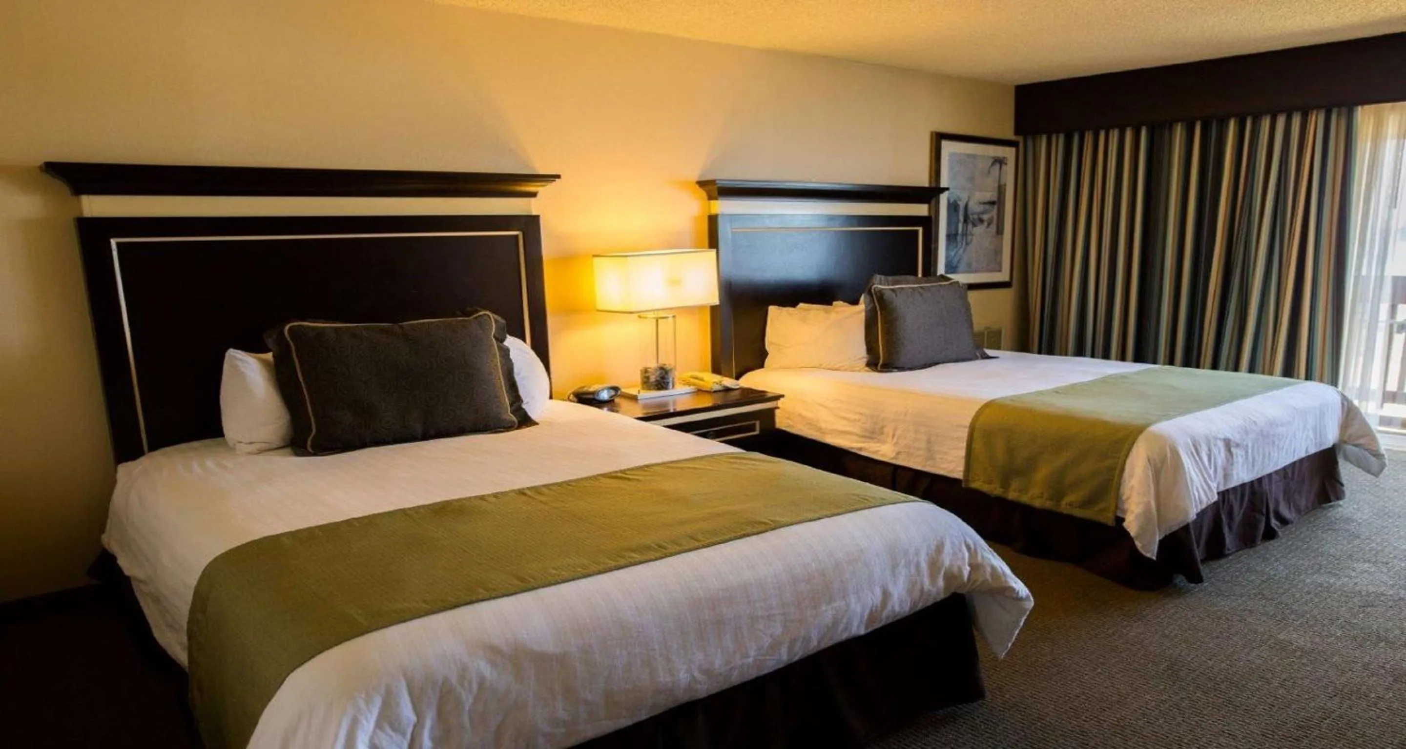 Photo of the whole room, Bed in Pacifica Lighthouse Hotel Trademark Collection by Wyndham