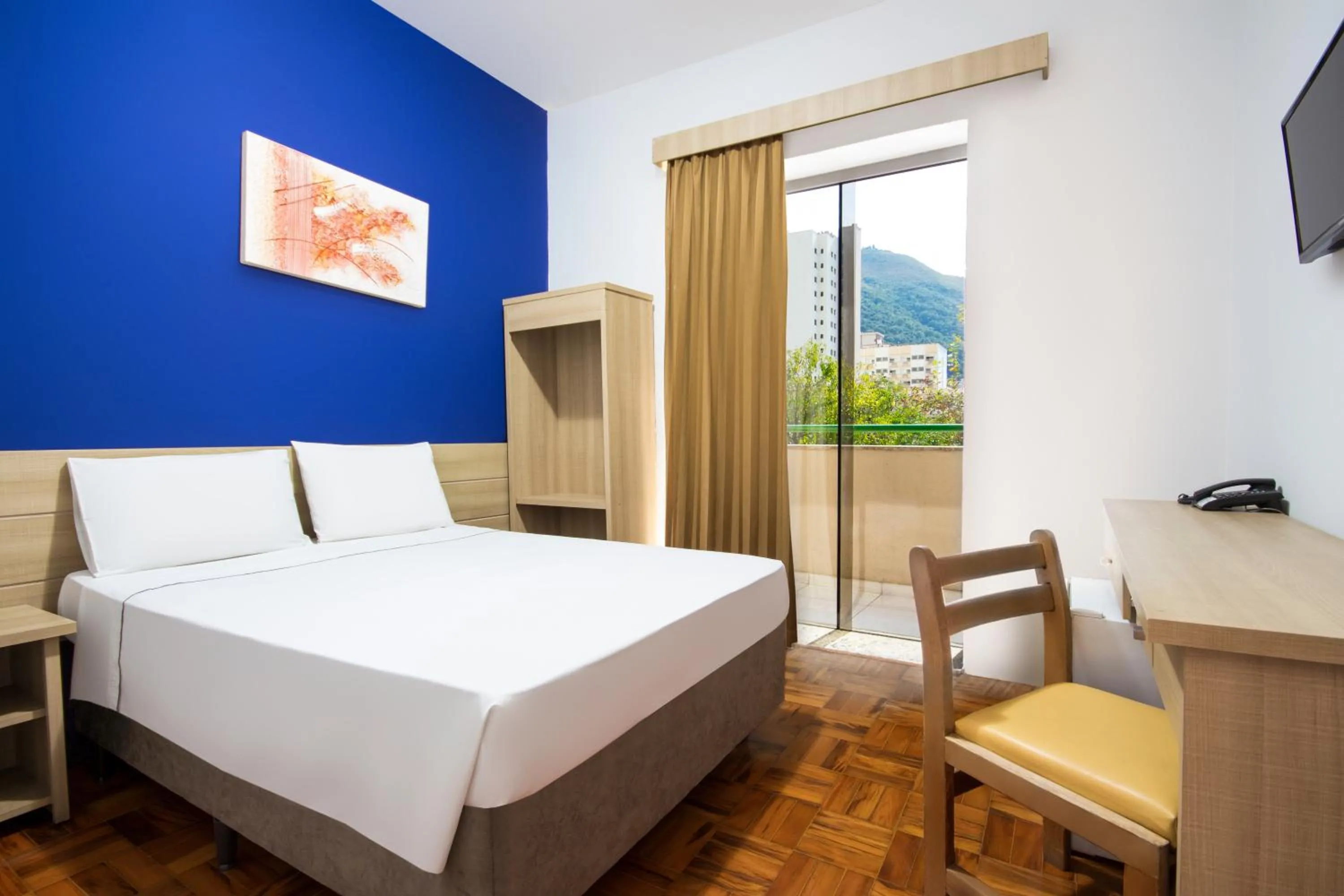 Bed in Hotel Euro Suite Poços de Caldas By Nacional Inn