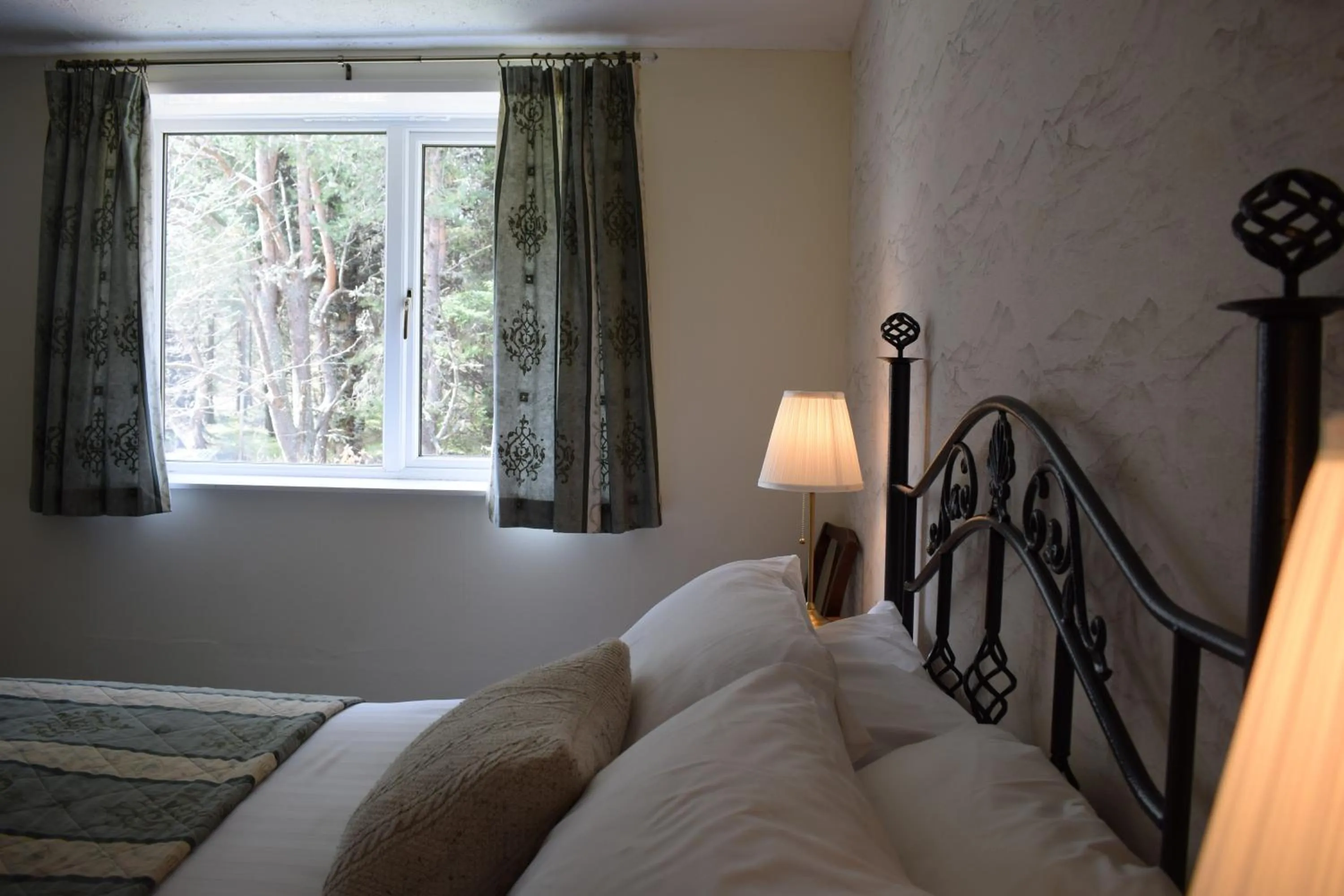 Bed in Glenan Lodge Self Catering