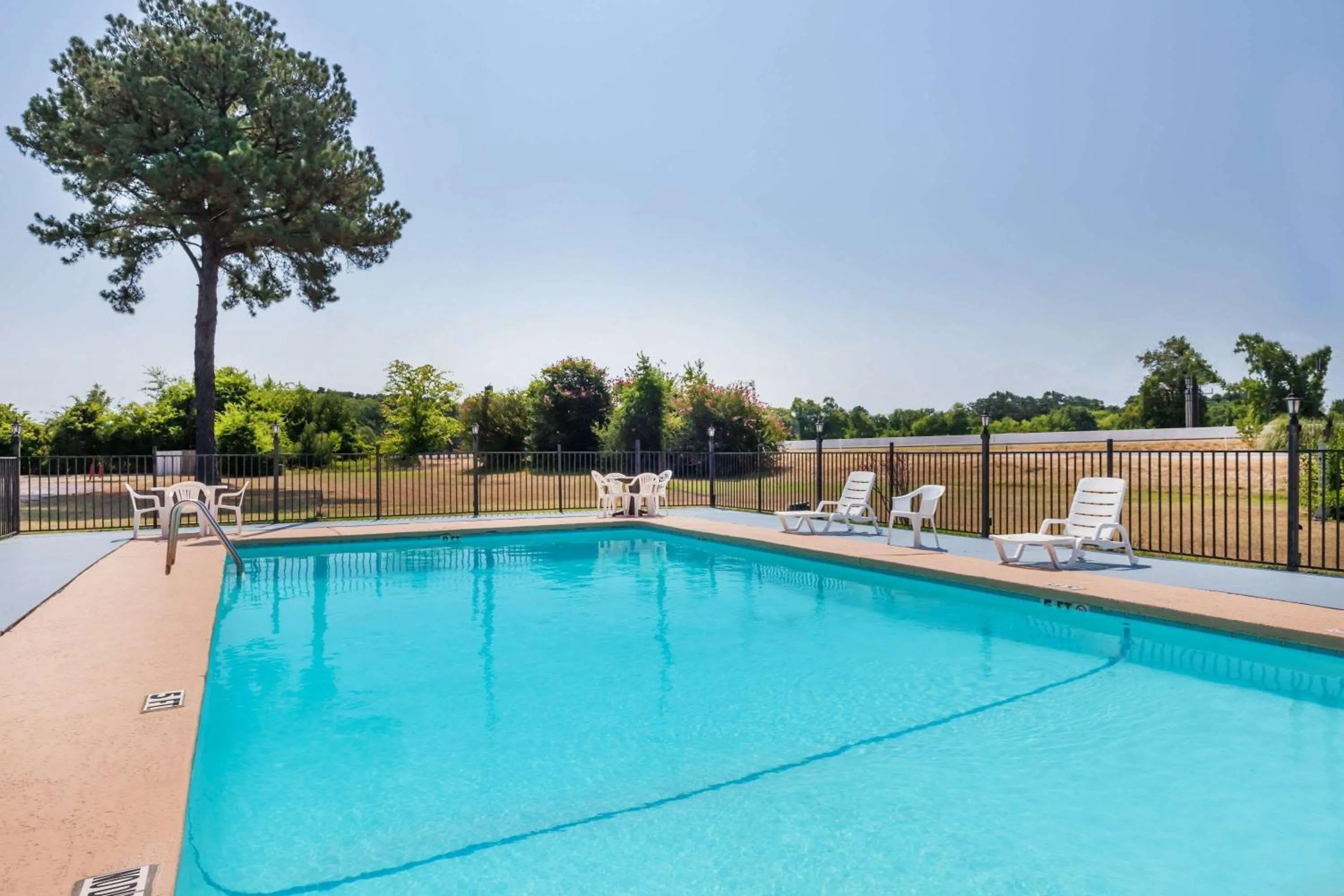 On site, Swimming Pool in Super 8 by Wyndham Longview/I-20