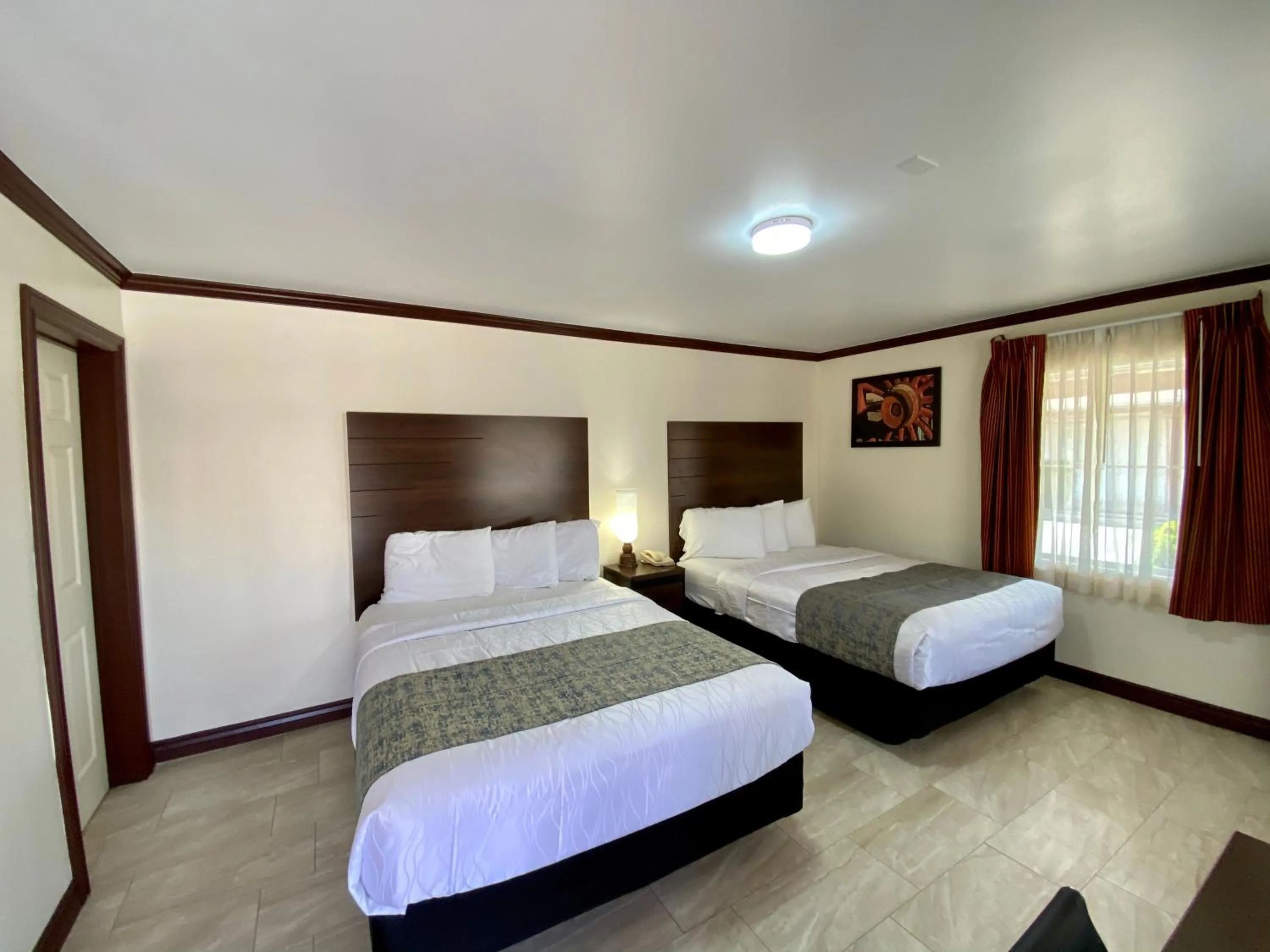 Bedroom, Bed in Roswell Inn