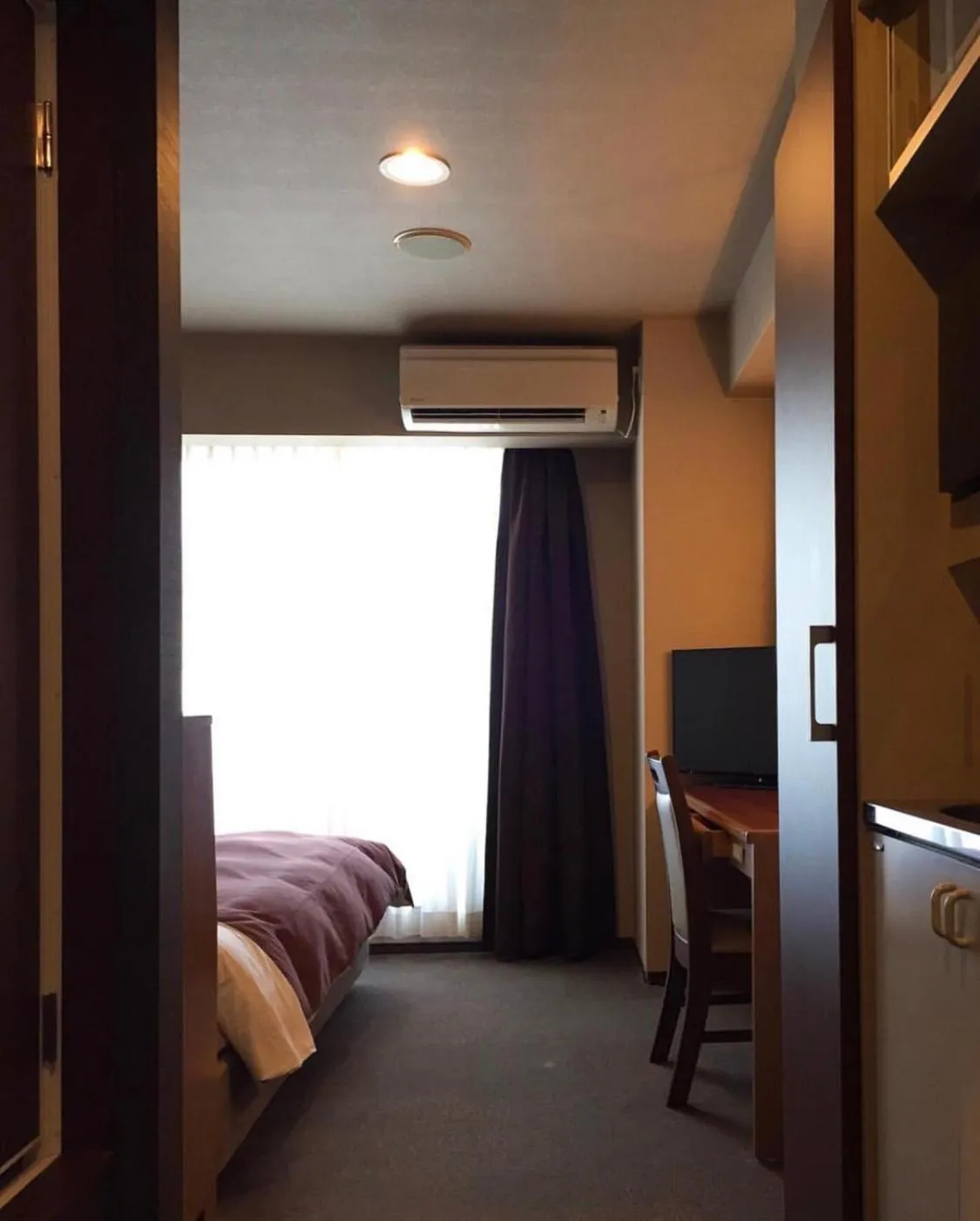 Bed in Nisshin Namba Inn