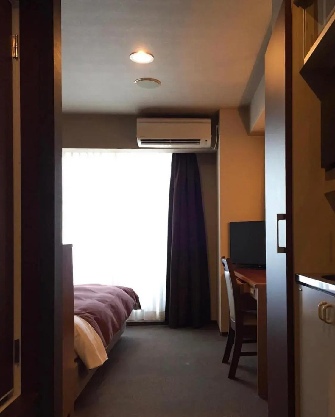 Bed in Nisshin Namba Inn Bed in Nisshin Namba Inn