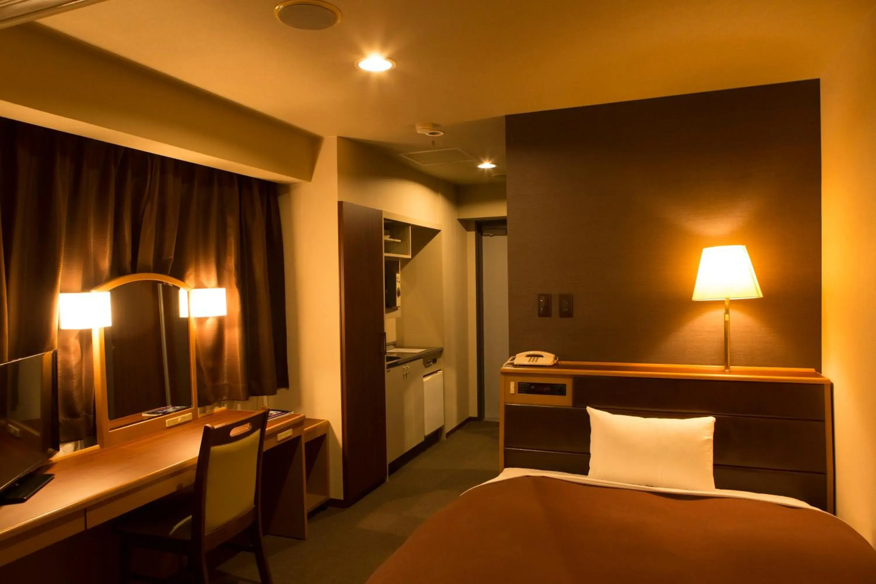 Communal lounge/ TV room, Bed in Nisshin Namba Inn Communal lounge/ TV room, Bed in Nisshin Namba Inn