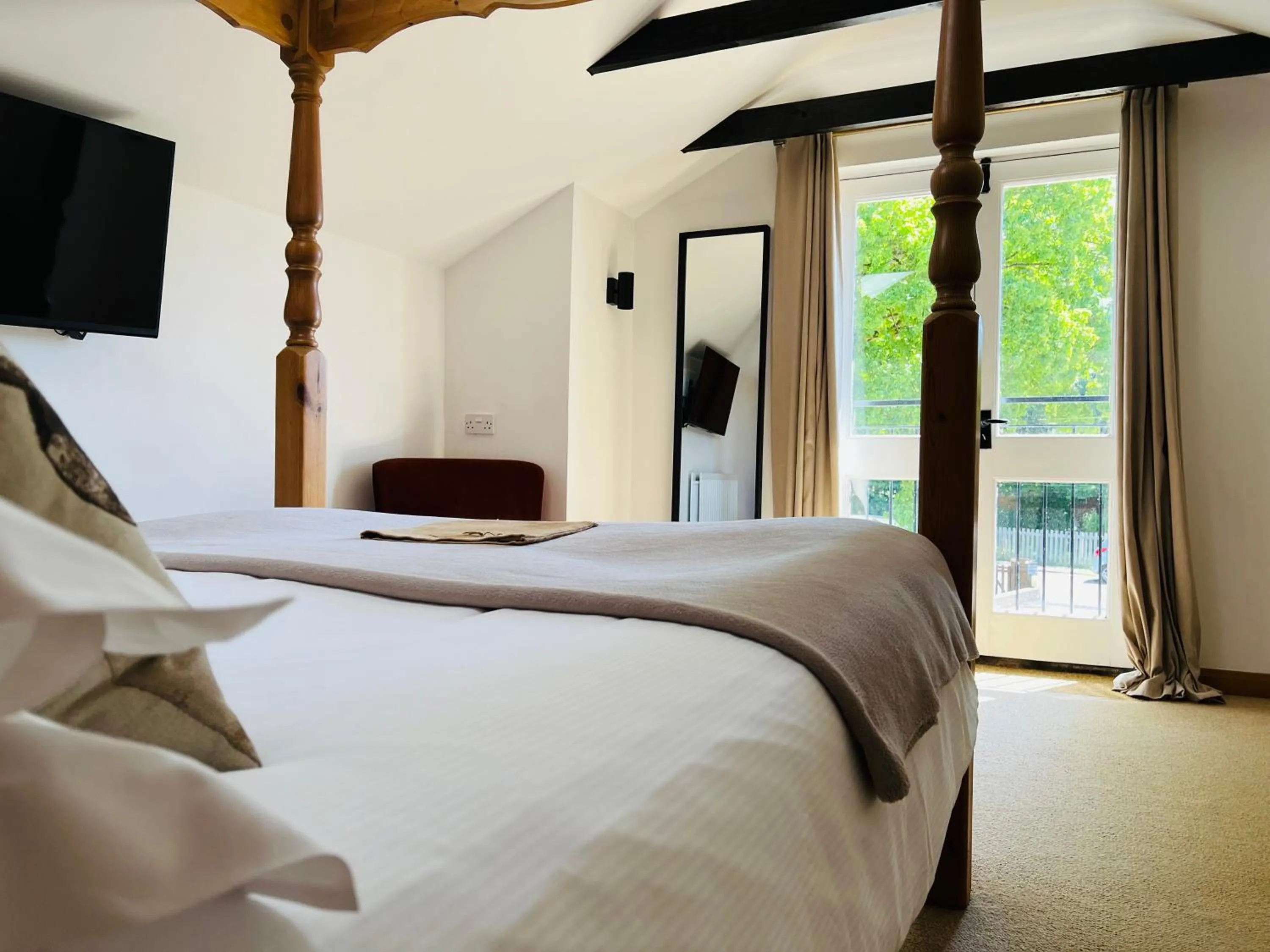 Bedroom, Bed in Cottage Lodge Hotel