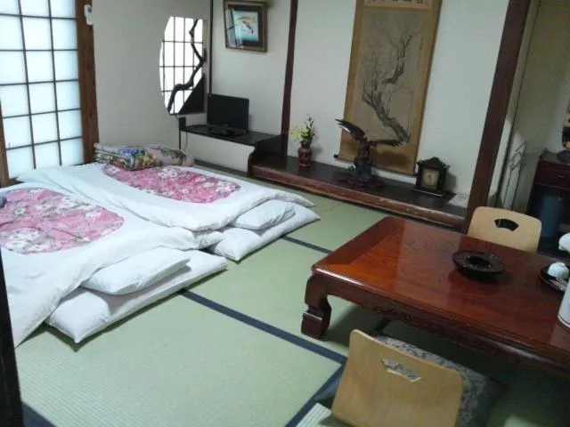 Photo of the whole room, Bed in Takigawa Ryokan