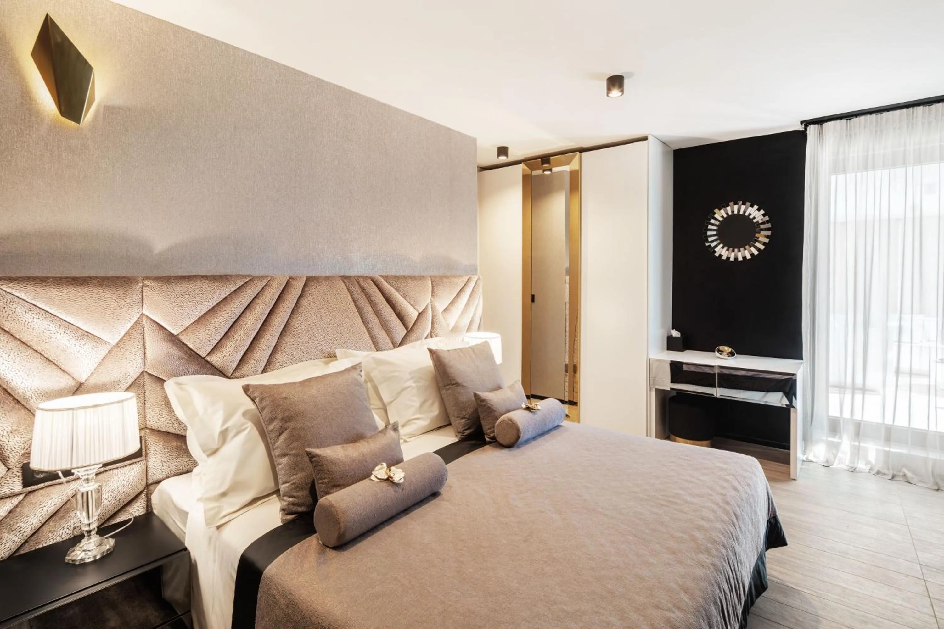 Bed in Posh Residence Luxury Suites