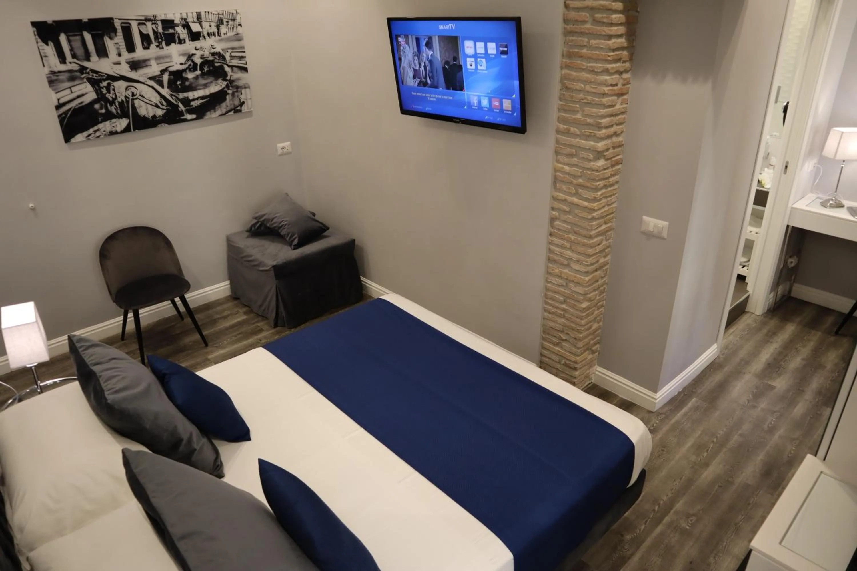 Photo of the whole room, Bed in MILLINA SUITES IN NAVONA