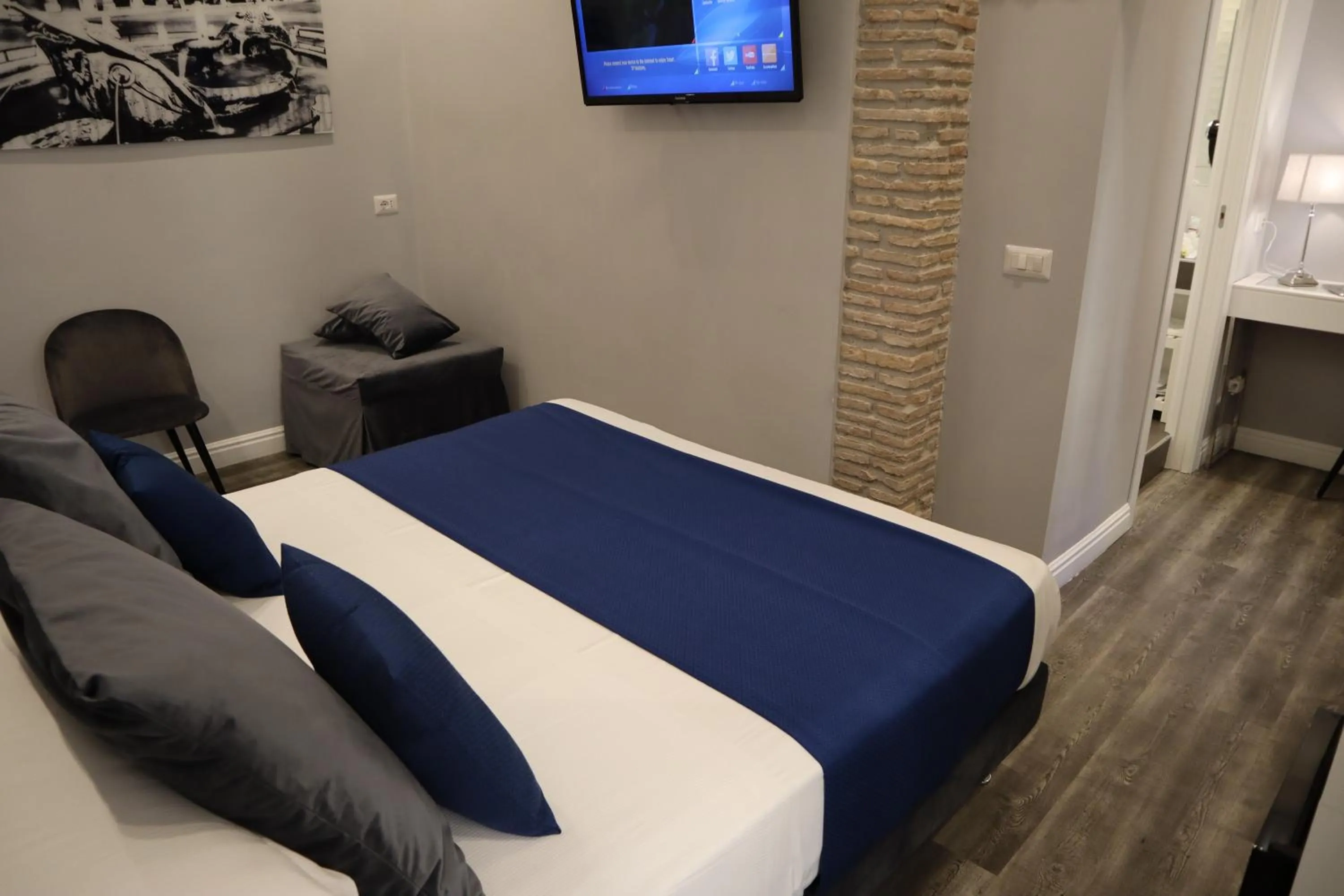 Photo of the whole room, Bed in MILLINA SUITES IN NAVONA