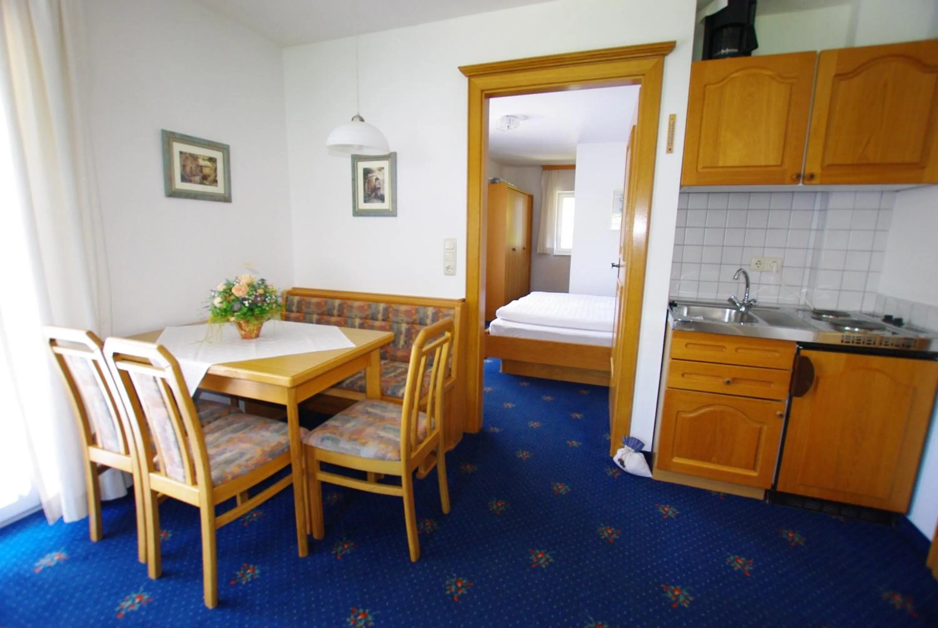 Kitchen or kitchenette, Bed in Hotel-Pension Heike