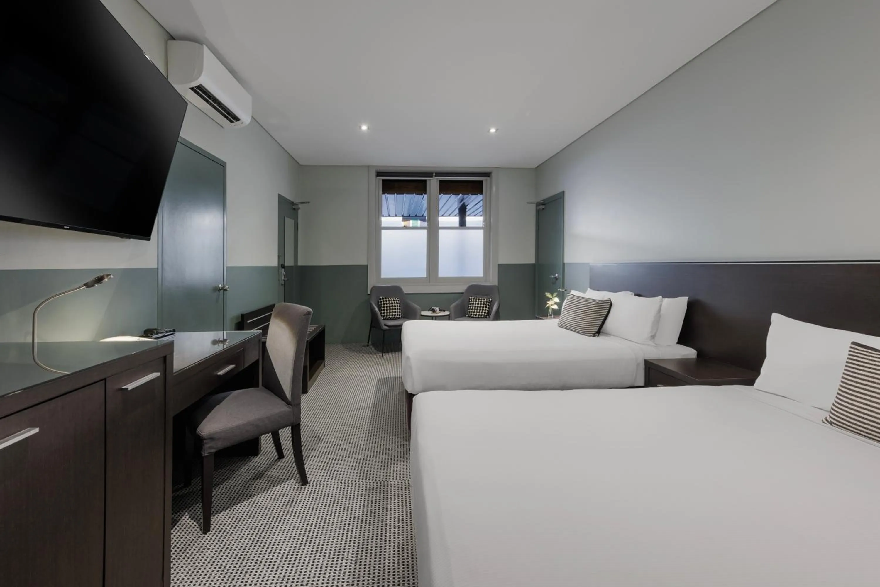 Bed in Vulcan Hotel Sydney