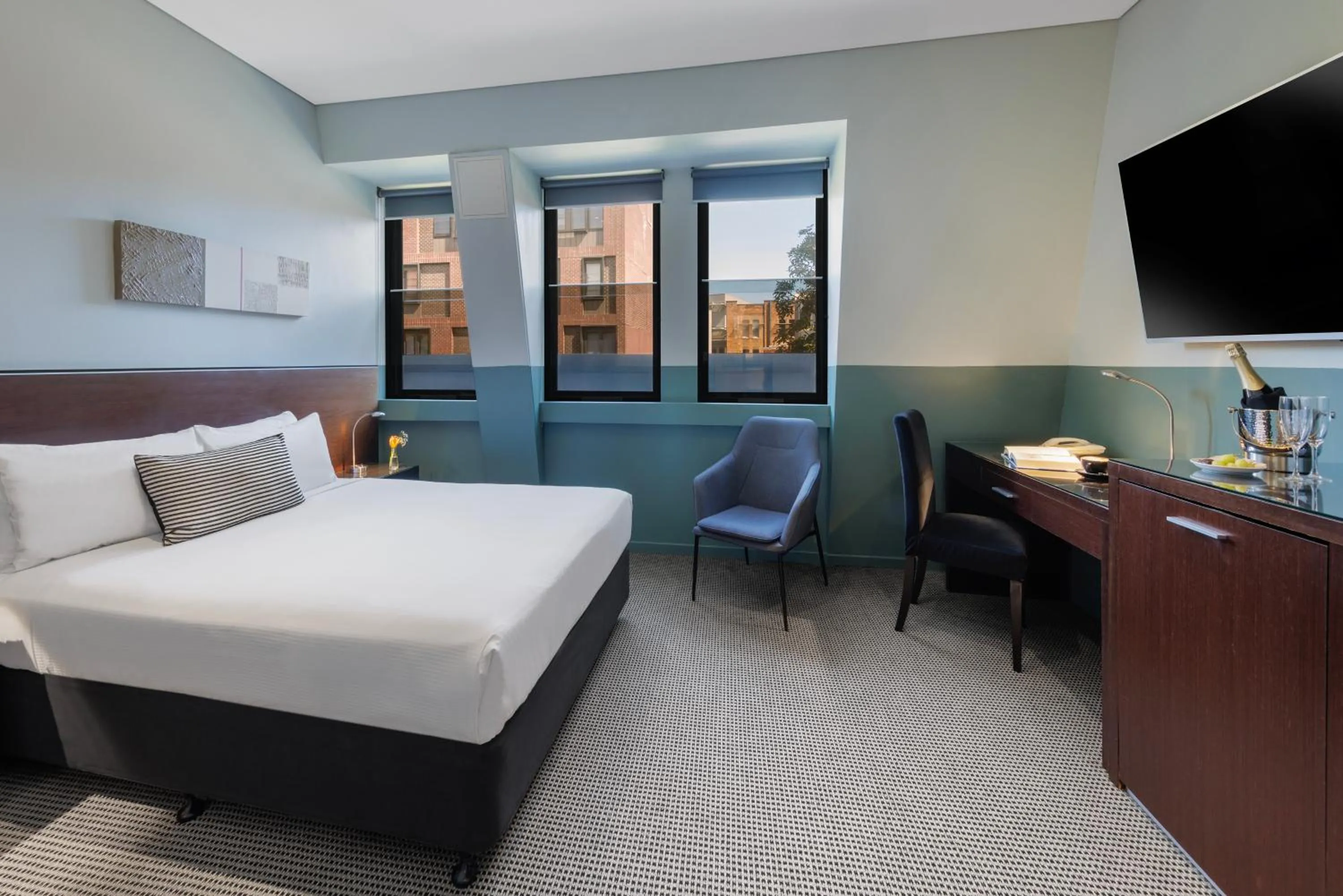 Bed in Vulcan Hotel Sydney