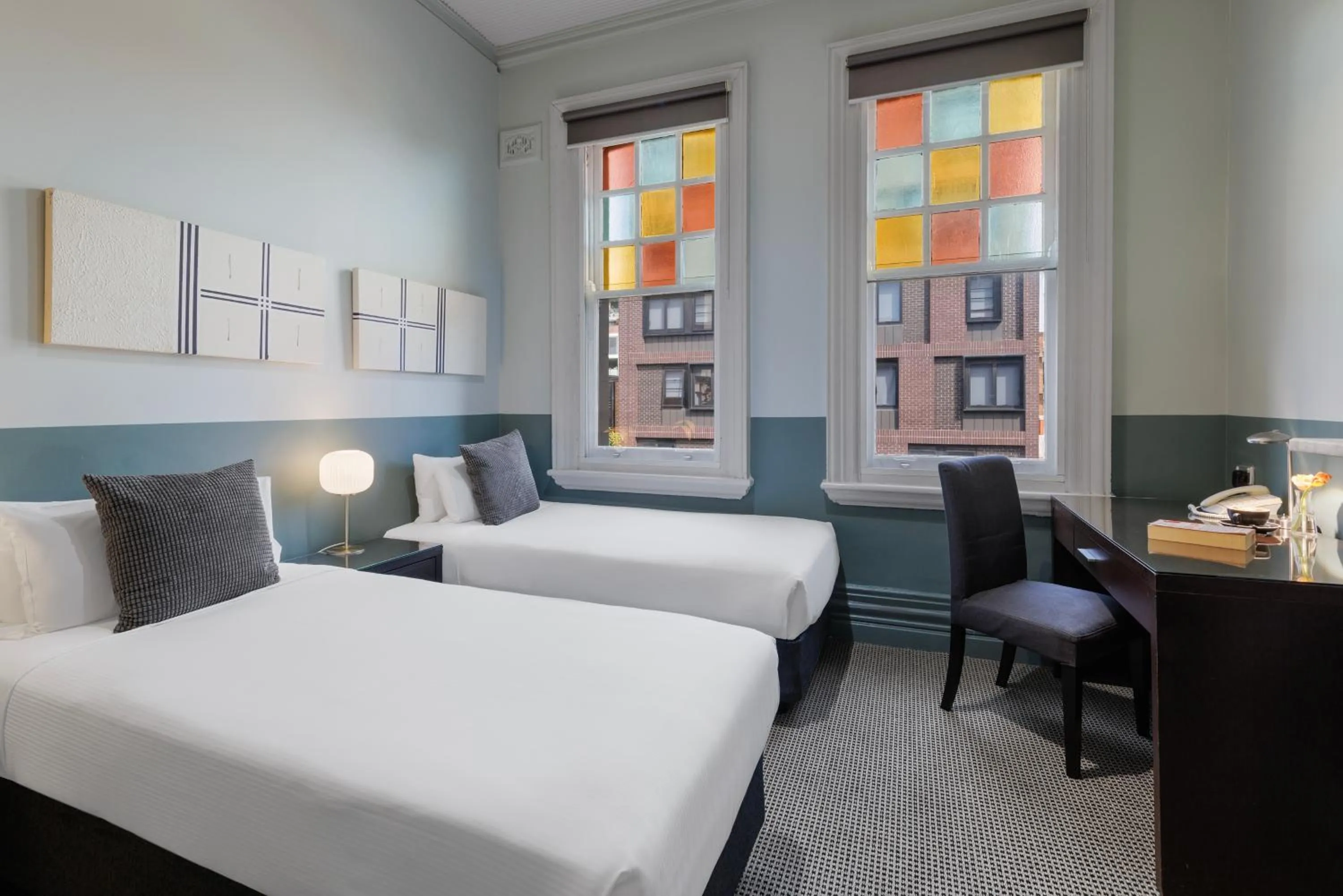 Bed in Vulcan Hotel Sydney