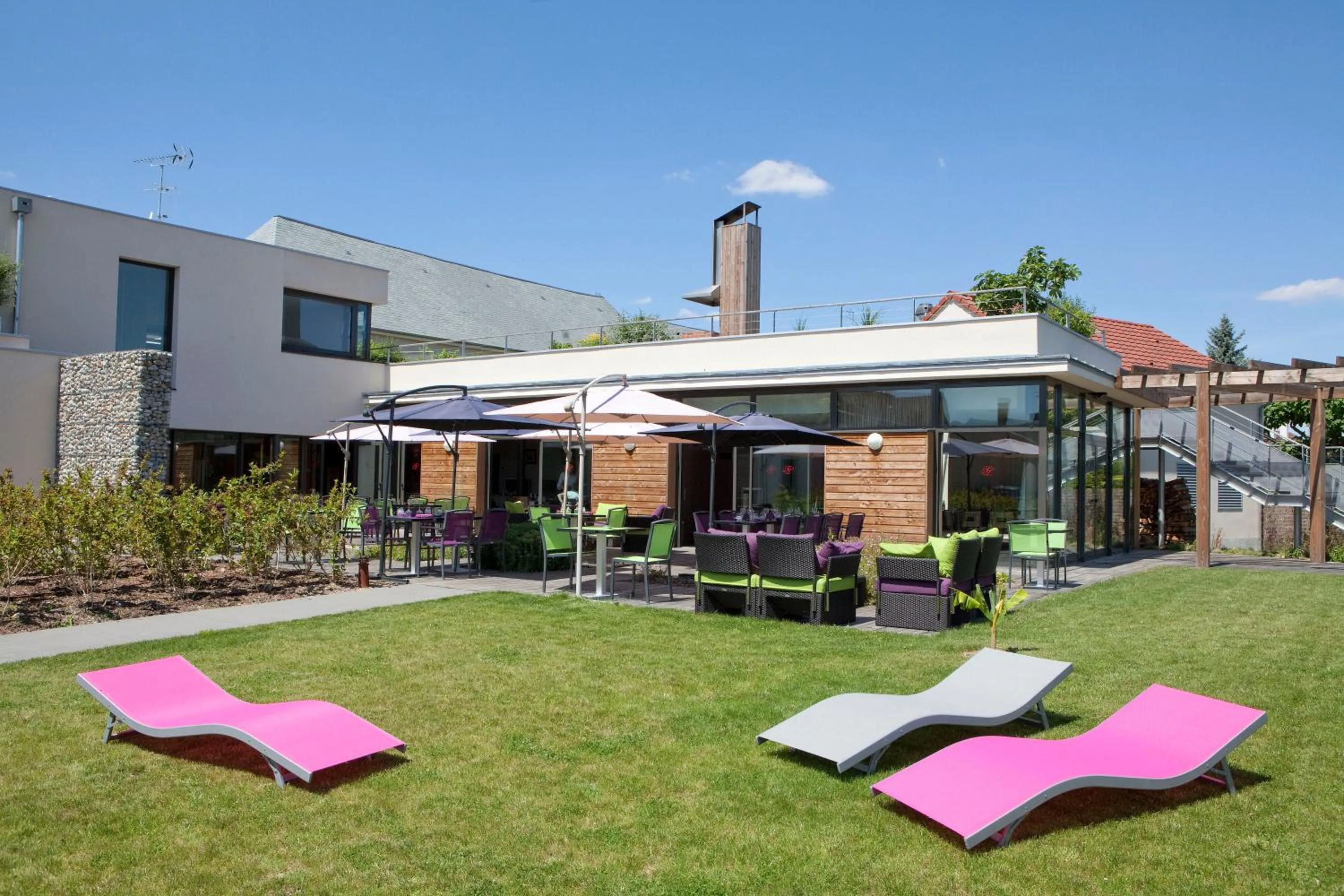 Garden in Logis Hôtel Terre de Loire
