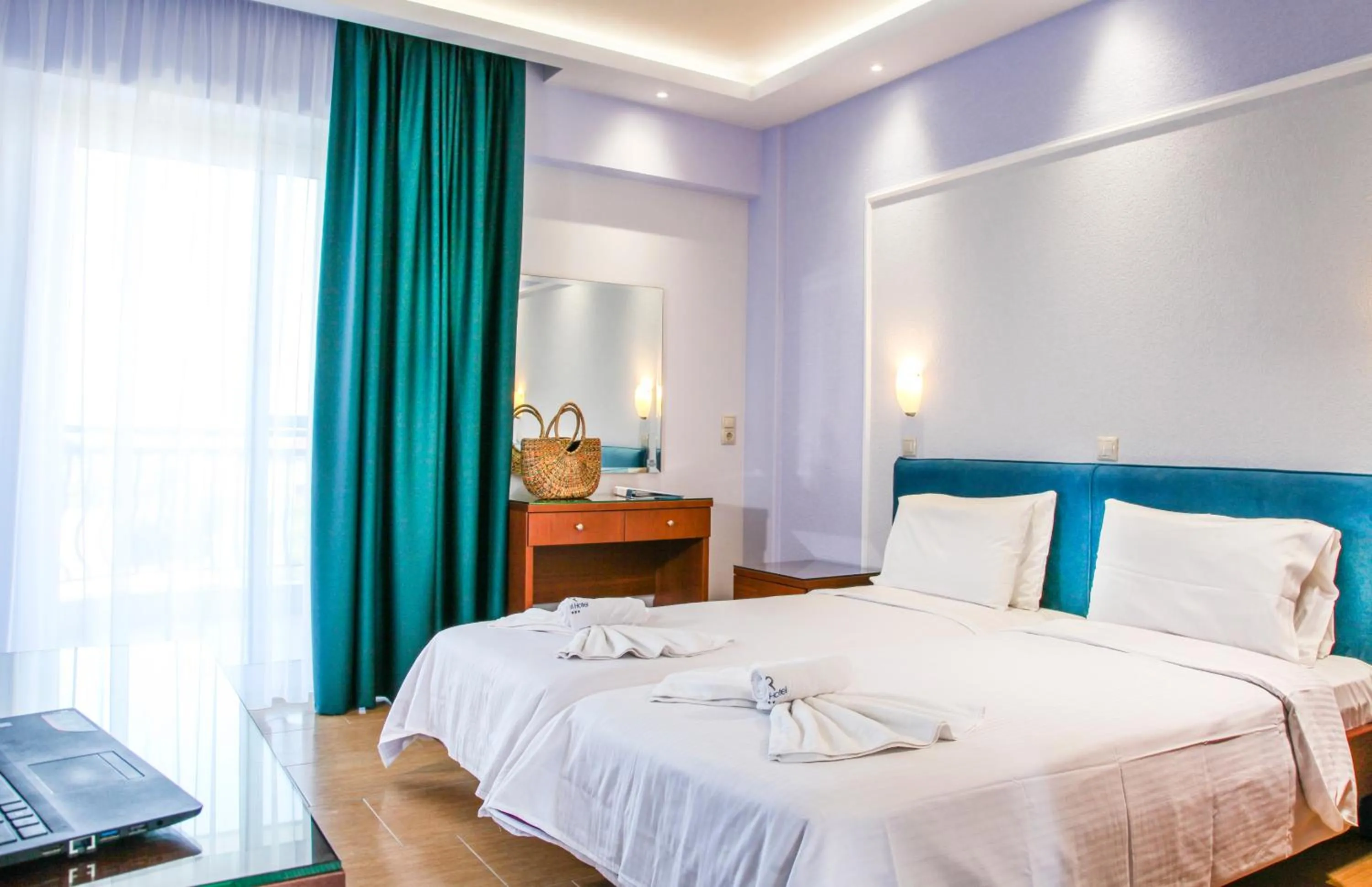 Bed in Royal Hotel and Suites