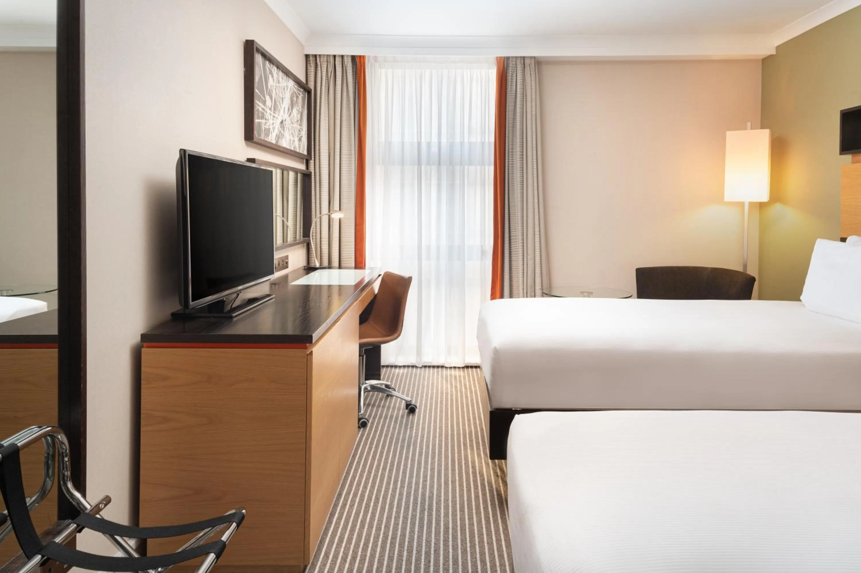 Bed in Hilton London Kensington Hotel