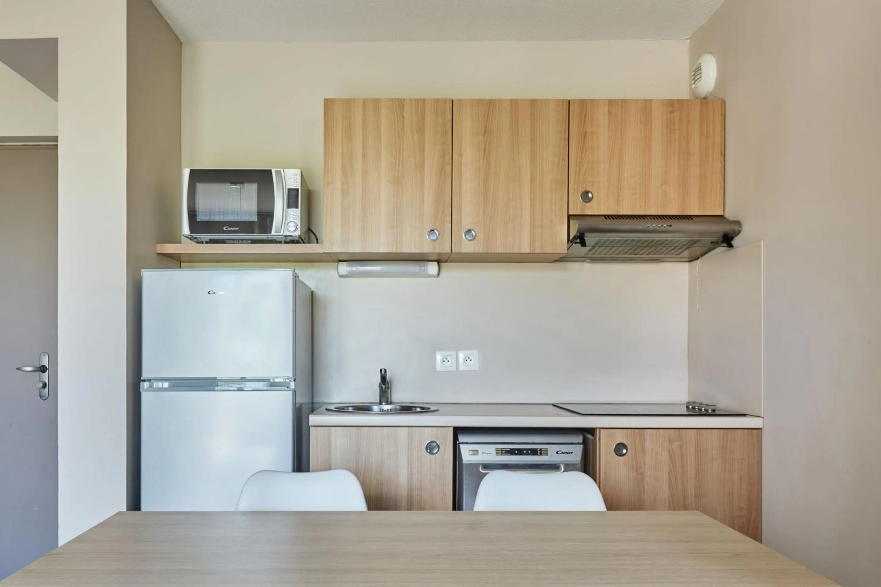 Kitchen or kitchenette in Résidence Odalys Les Océanides