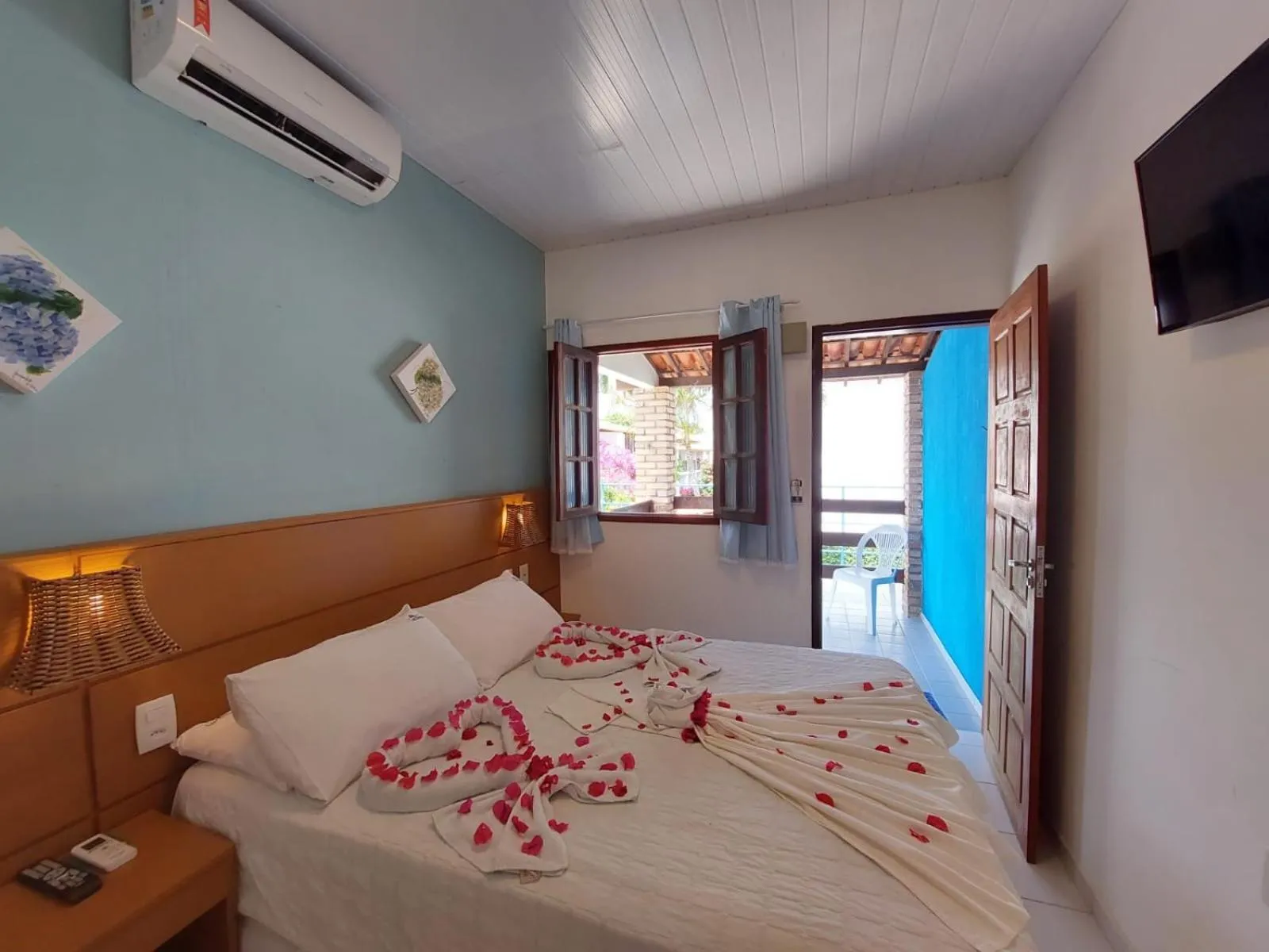 Photo of the whole room, Bed in Pousada Lua Azul