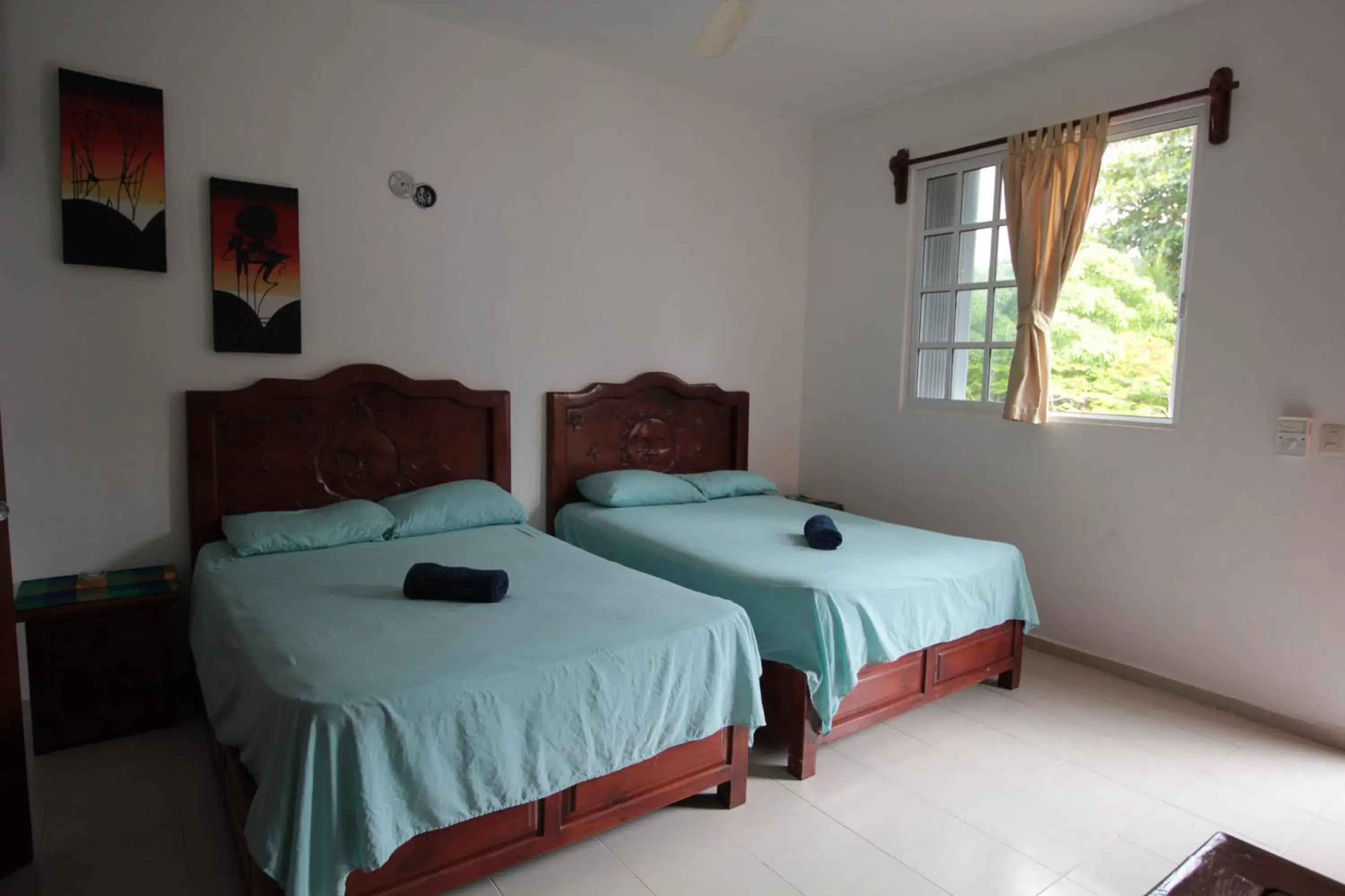 Two Double Queen Room With Access to the Beach in Villas Roseliz Two Double Queen Room With Access to the Beach in Villas Roseliz