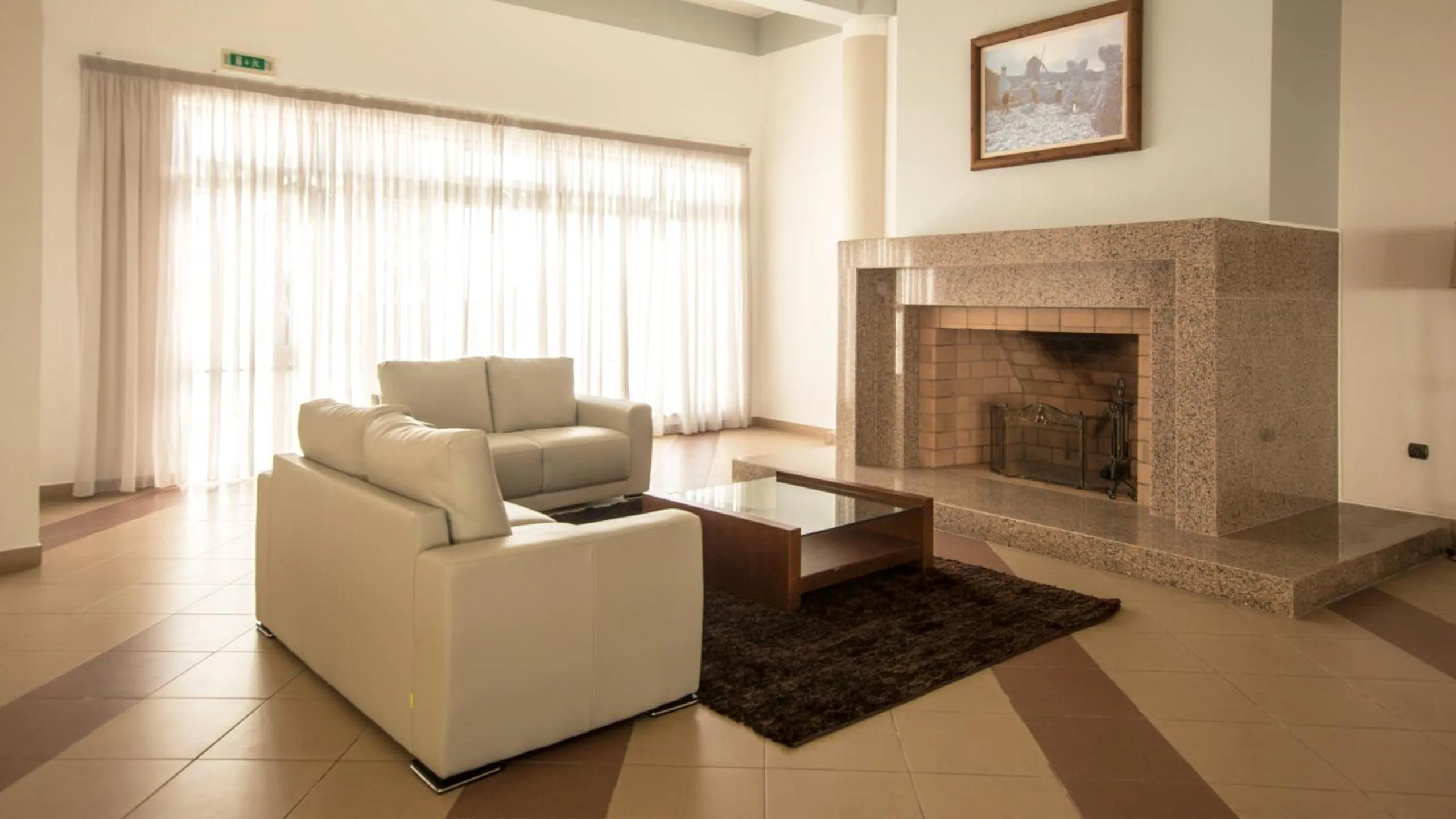 Communal lounge/ TV room in Hotel Santa Maria