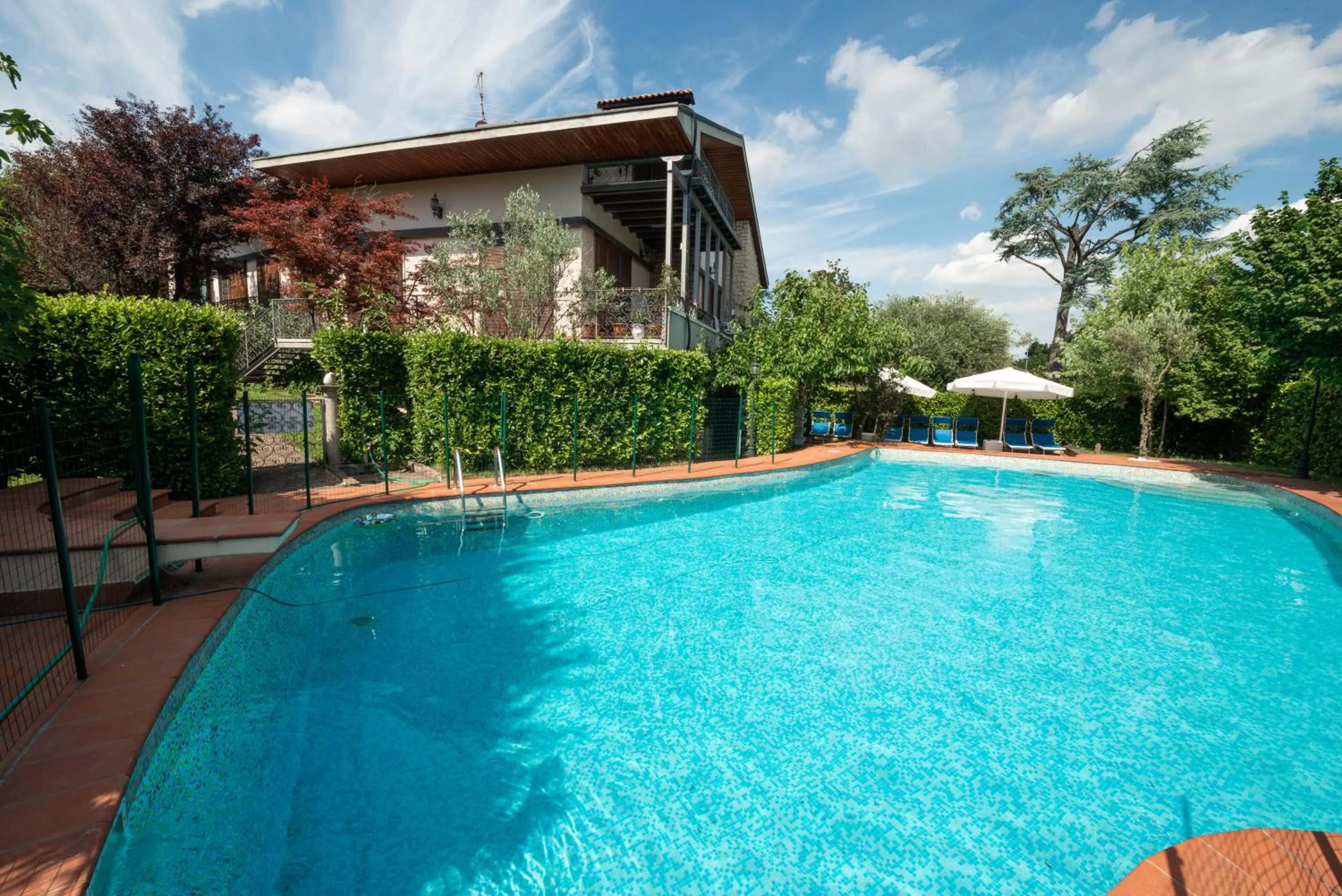 Swimming pool in B&B Family First