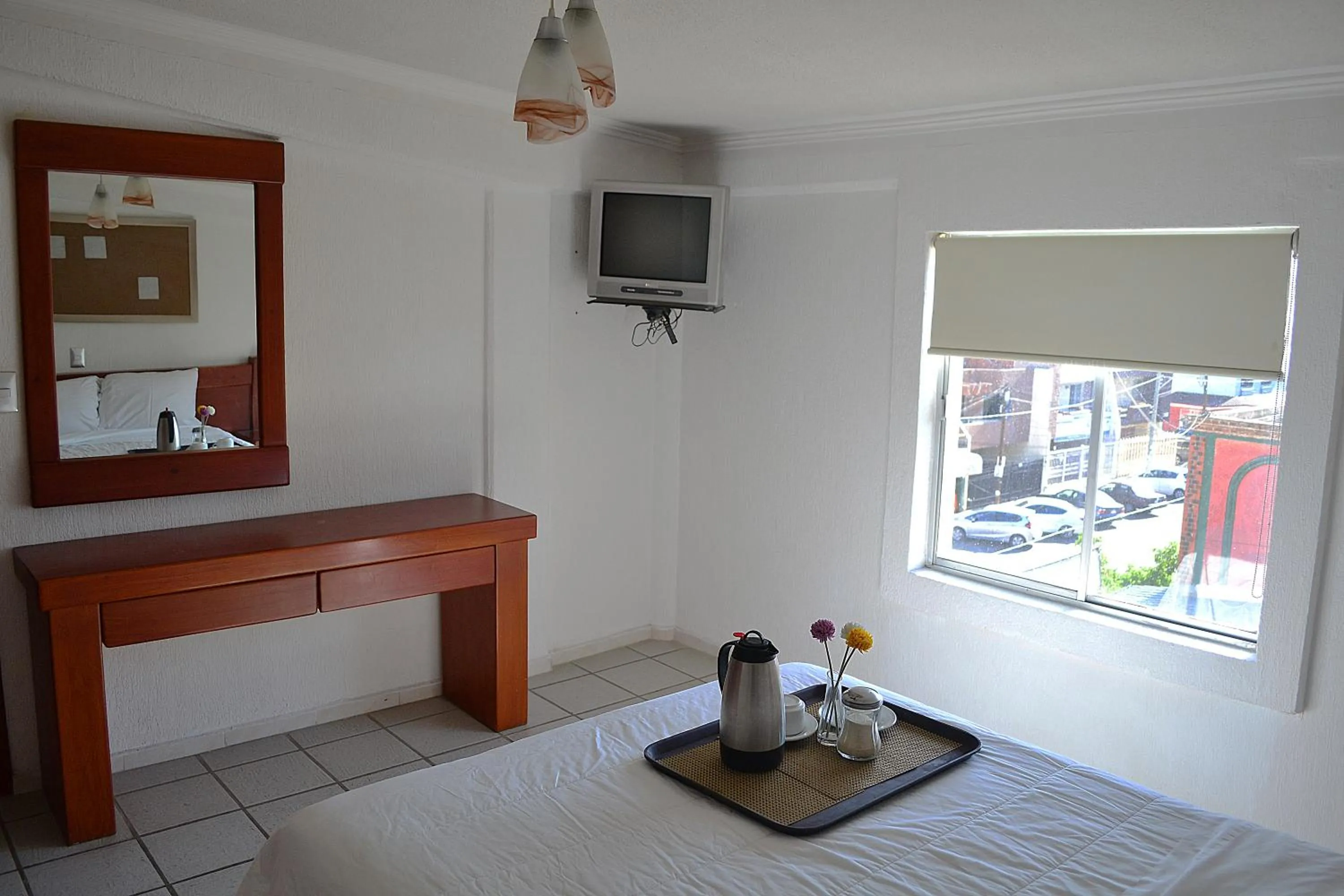 Bedroom in Hotel Campestre Inn