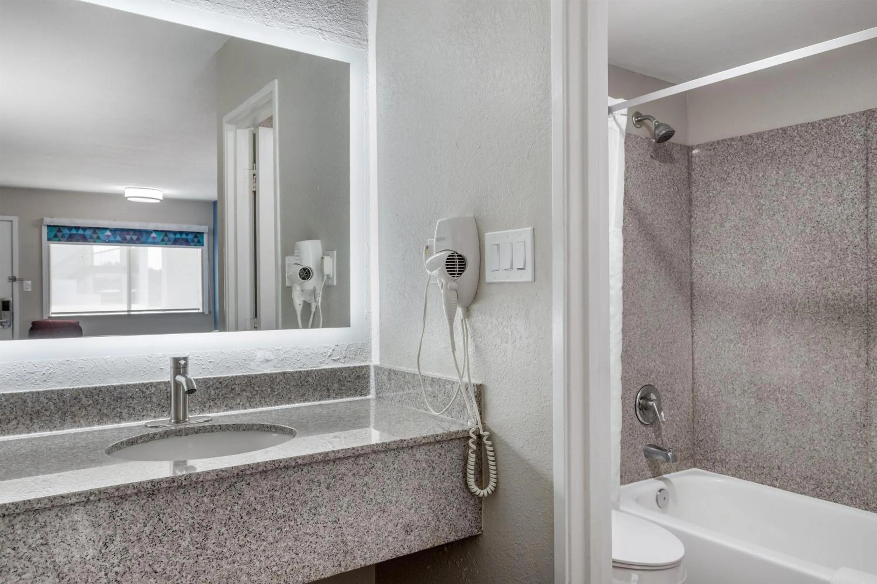 Bathroom in SureStay Hotel by Best Western Spring North Houston