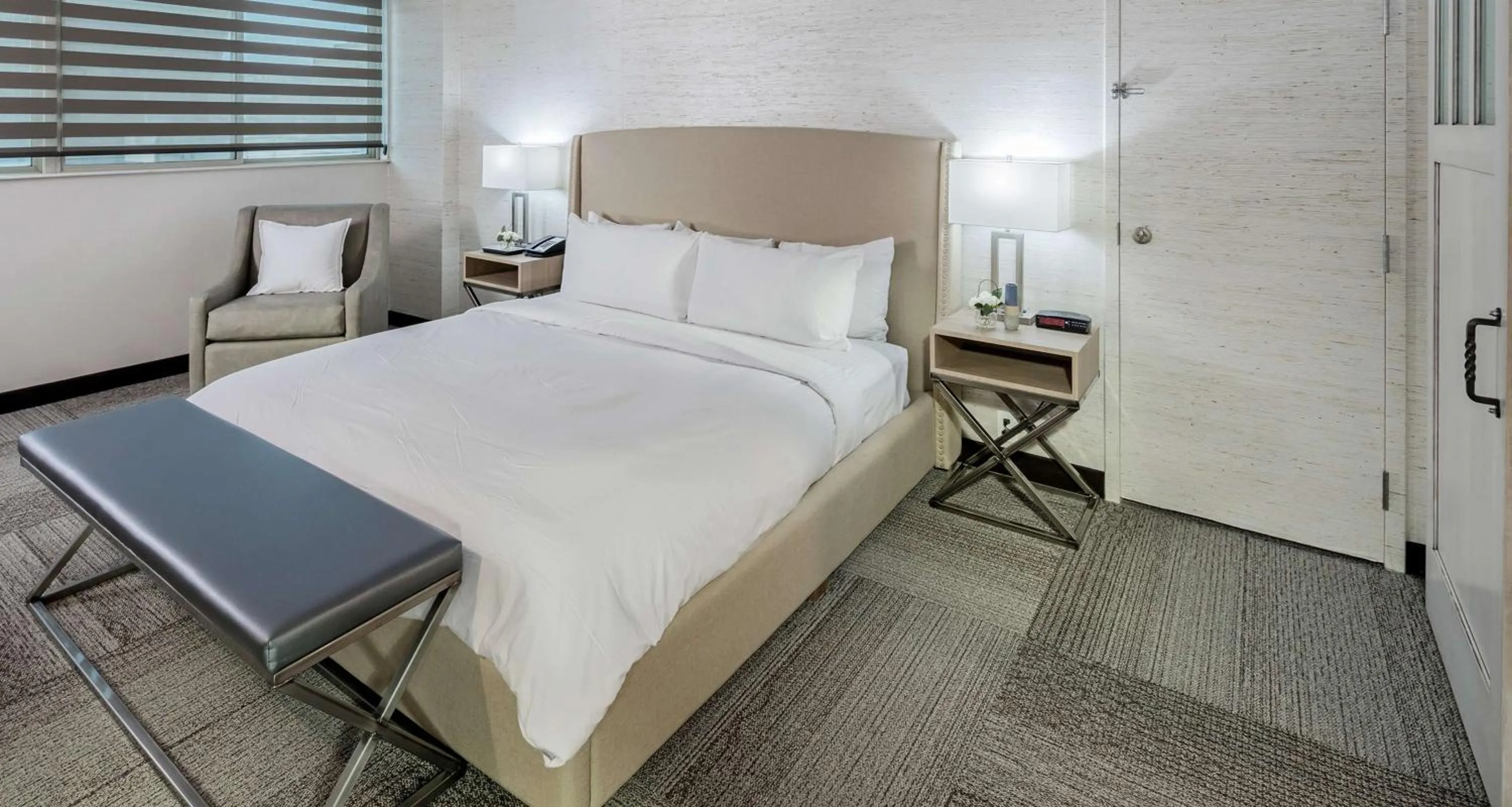 Photo of the whole room, Bed in The Rushmore Hotel & Suites; BW Premier Collection