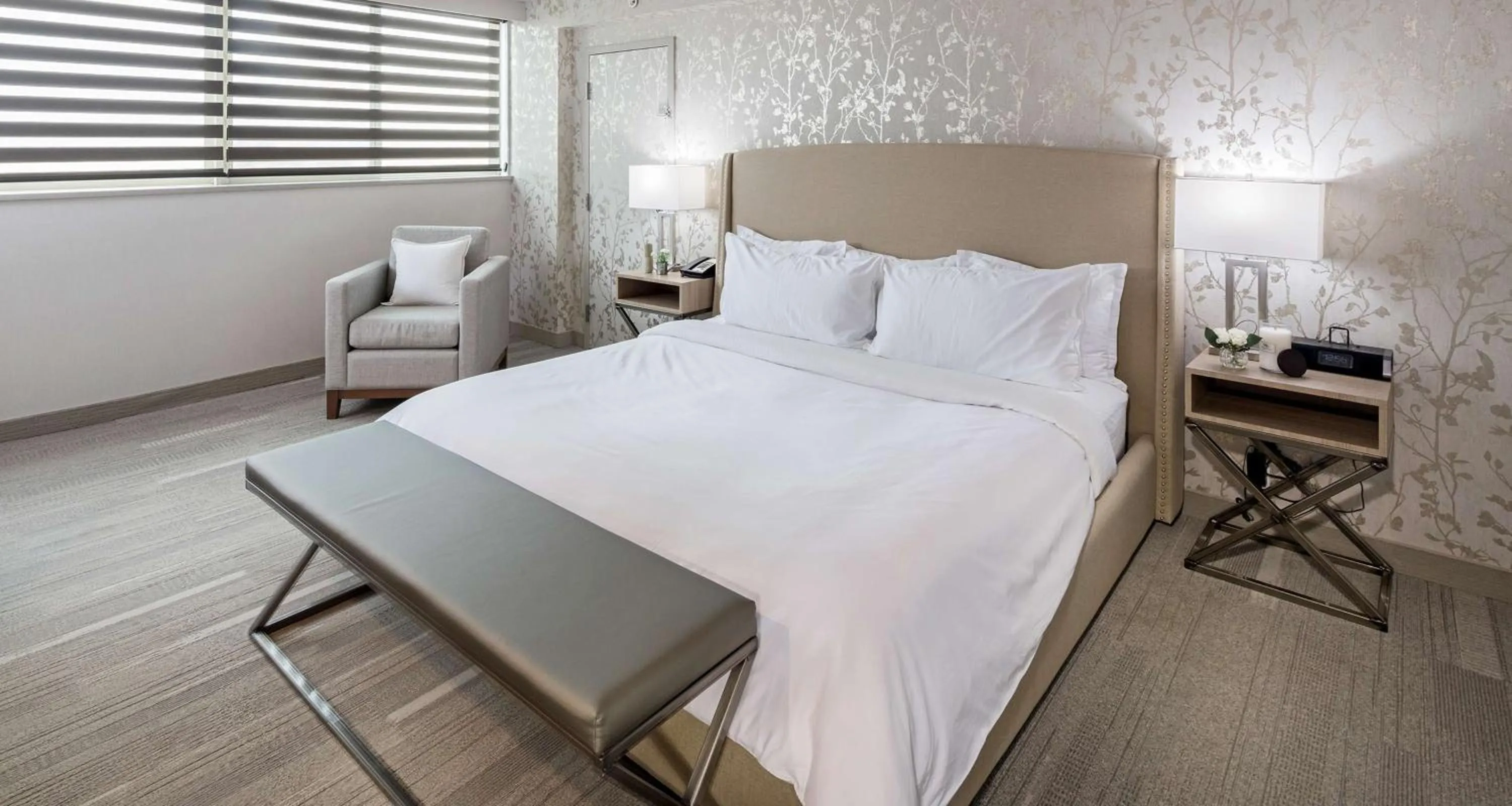 Photo of the whole room, Bed in The Rushmore Hotel & Suites; BW Premier Collection