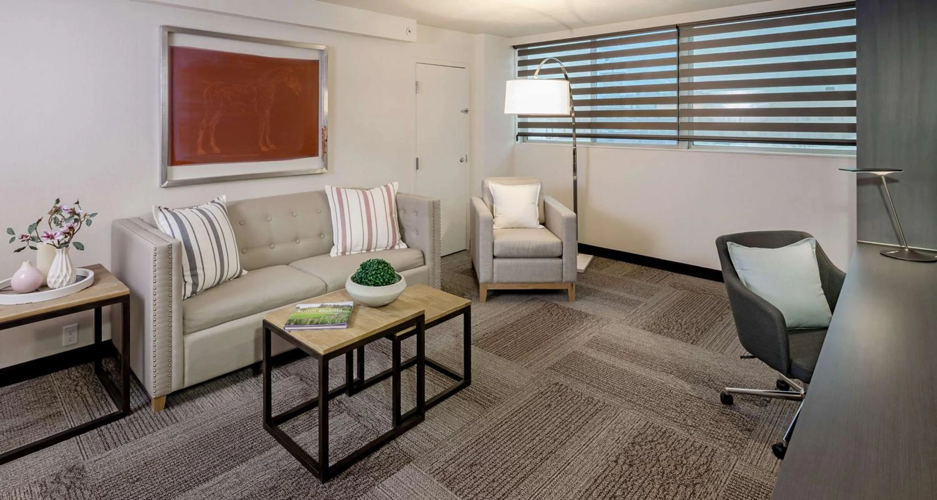 Photo of the whole room in The Rushmore Hotel & Suites; BW Premier Collection