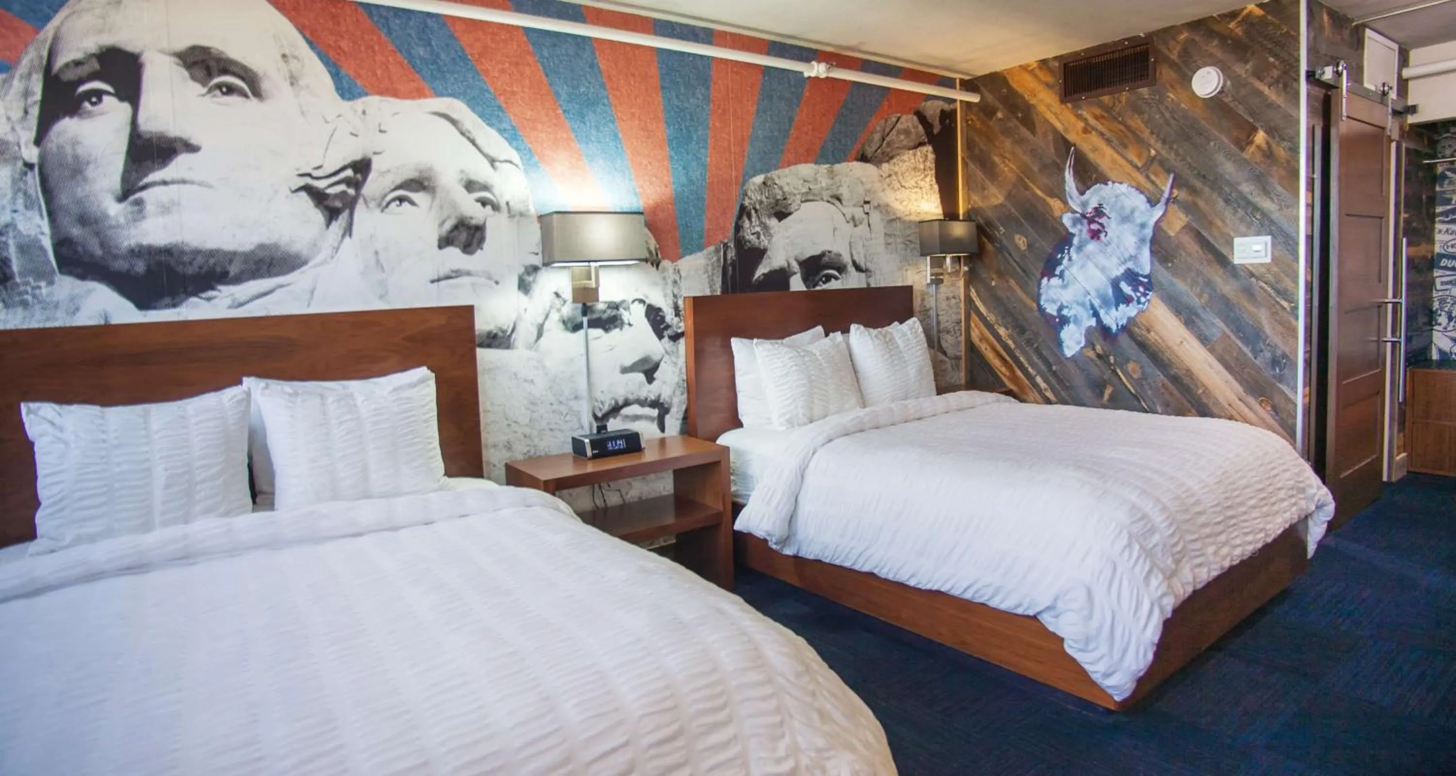 Photo of the whole room, Bed in The Rushmore Hotel & Suites; BW Premier Collection