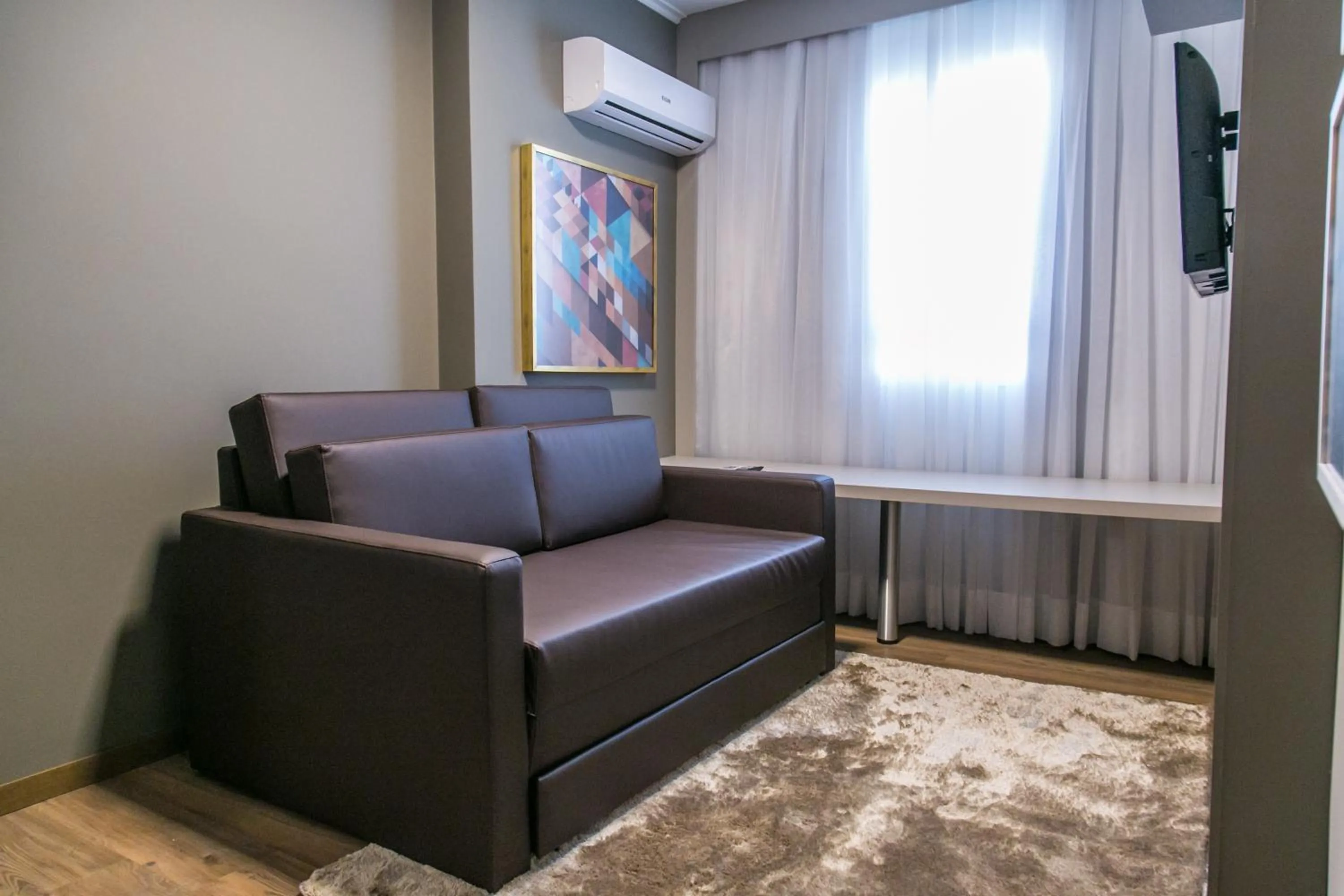 Living room in Tri Hotel Premium Criciúma