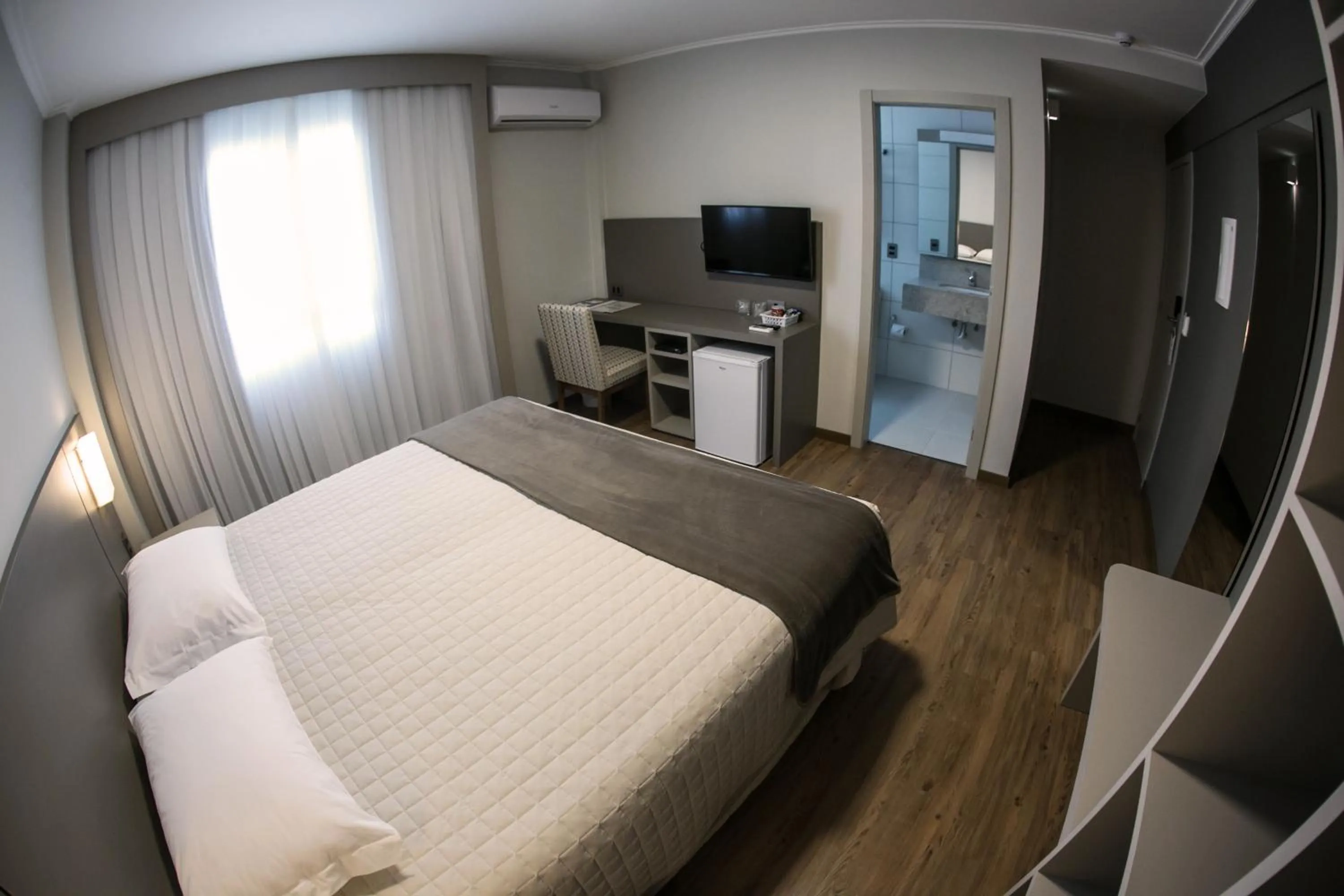 Photo of the whole room, Bed in Tri Hotel Premium Criciúma