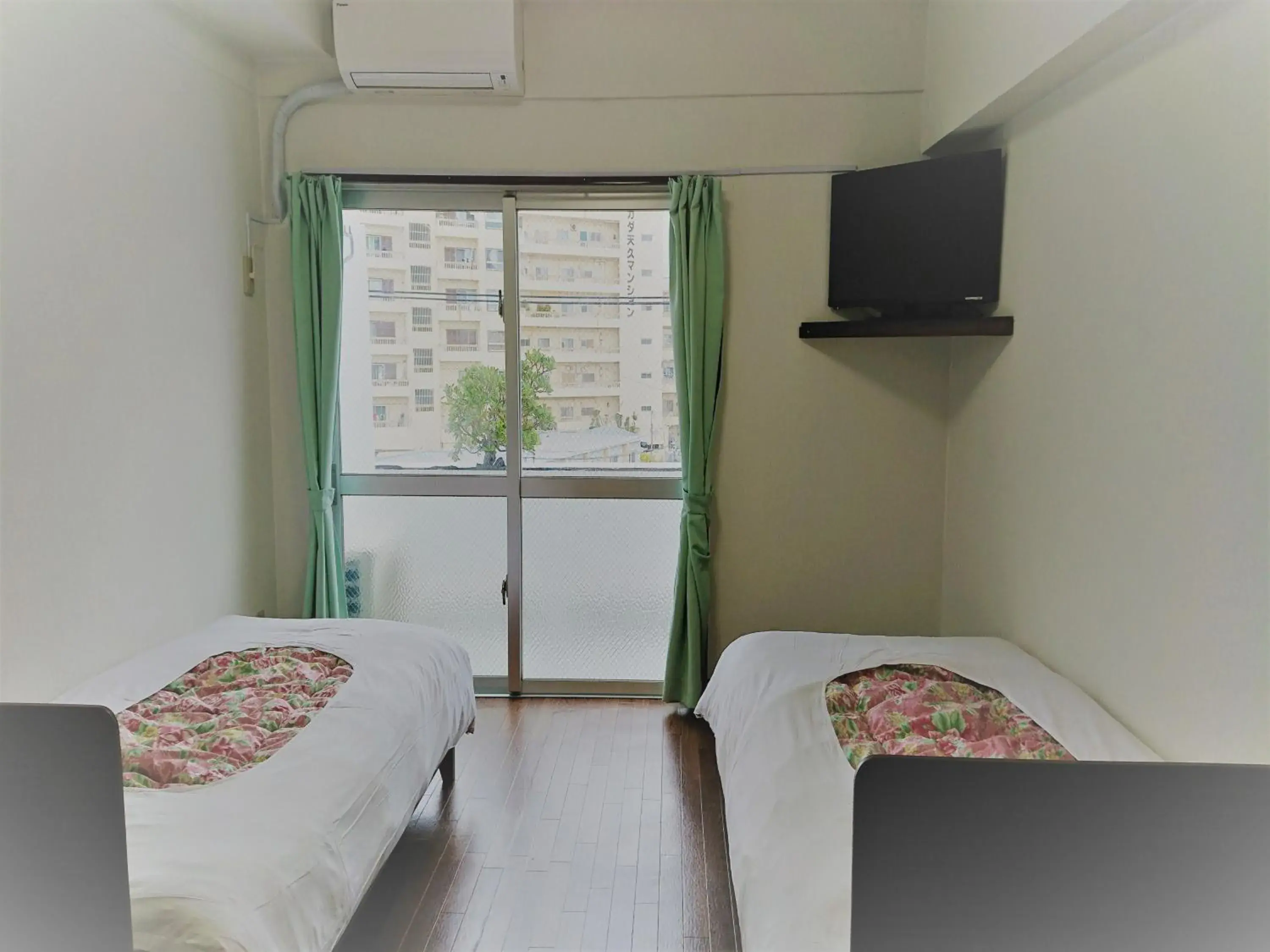 Bedroom in Sunset Hills Inn Naha Bedroom in Sunset Hills Inn Naha