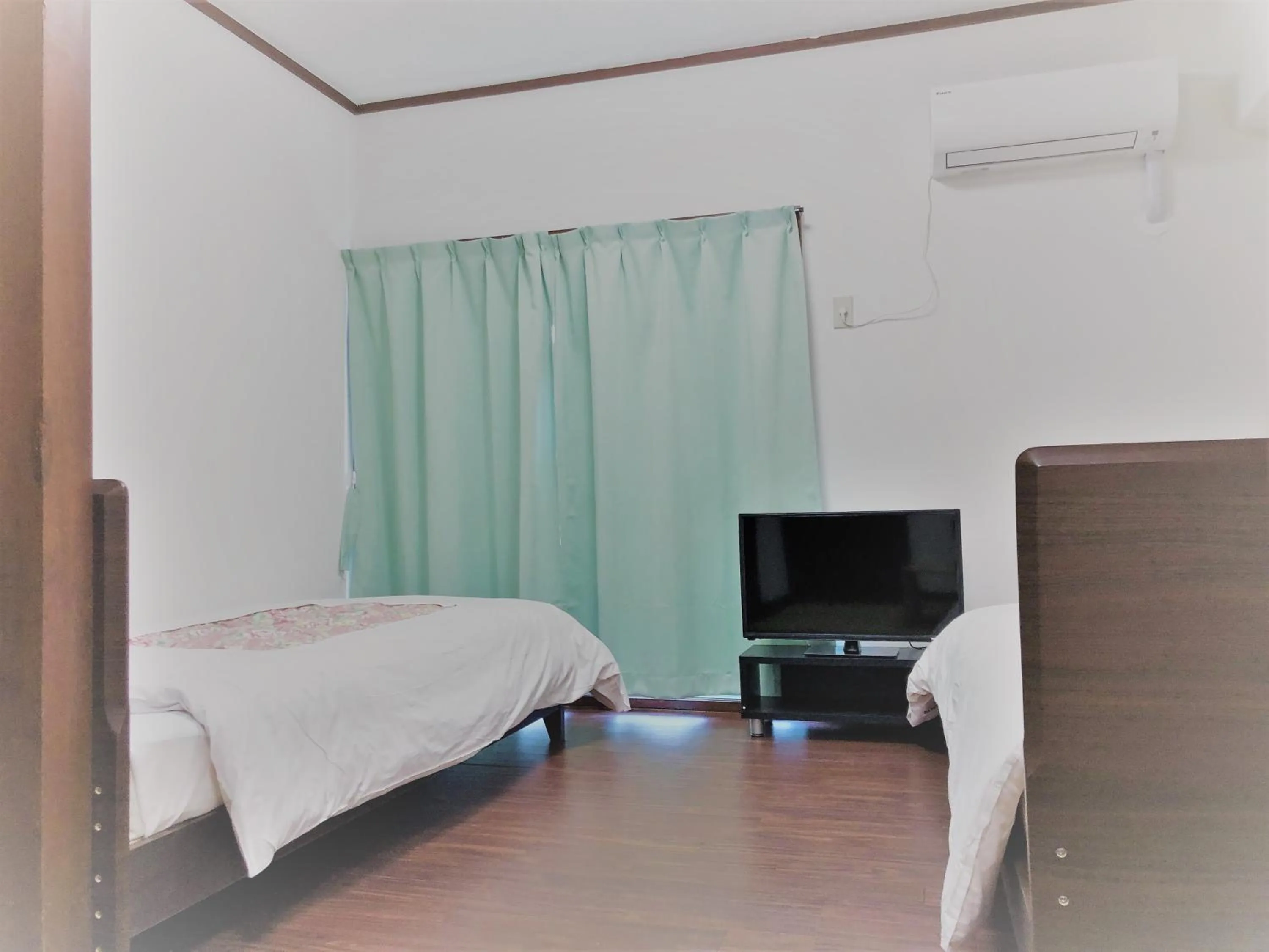 Photo of the whole room in Sunset Hills Inn Naha