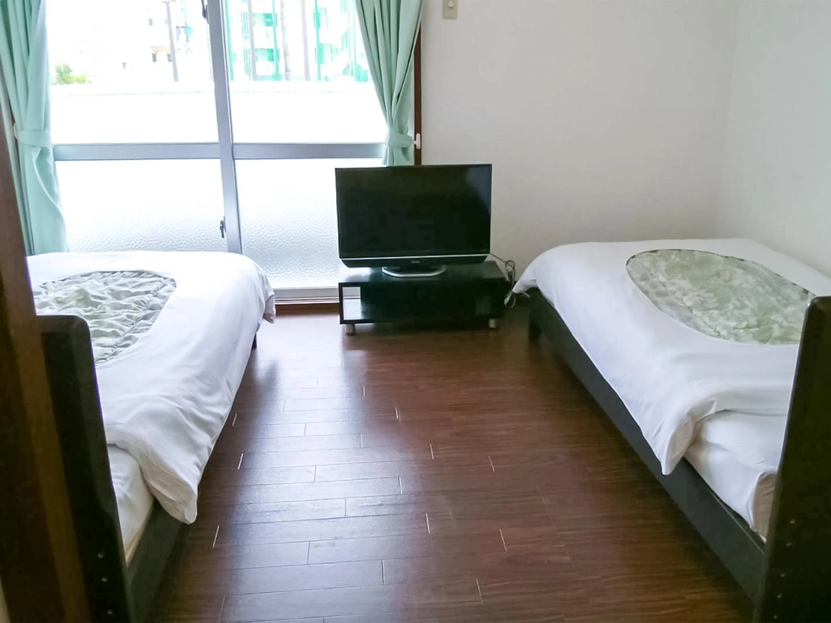 Photo of the whole room in Sunset Hills Inn Naha