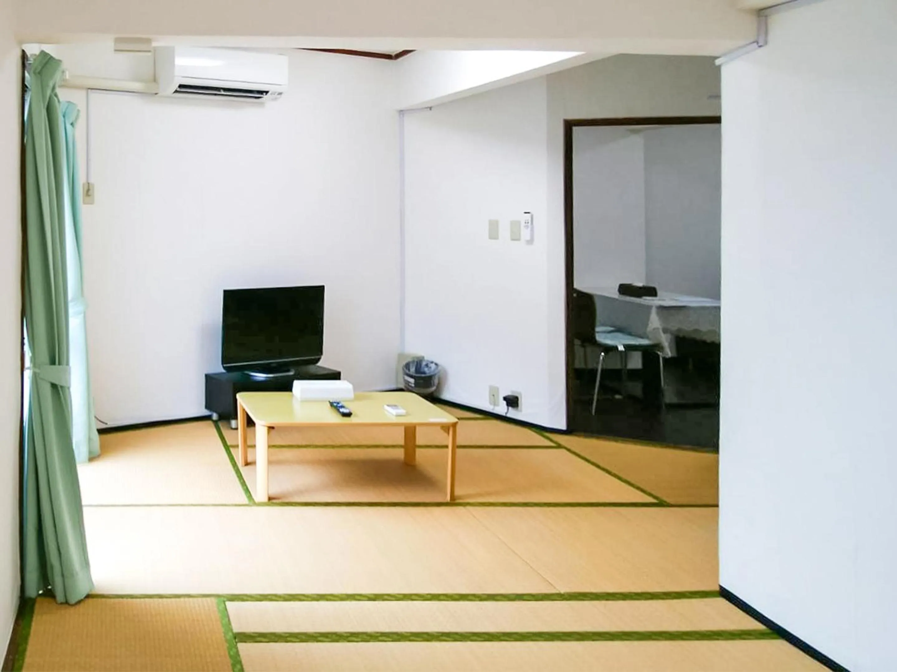 Photo of the whole room in Sunset Hills Inn Naha