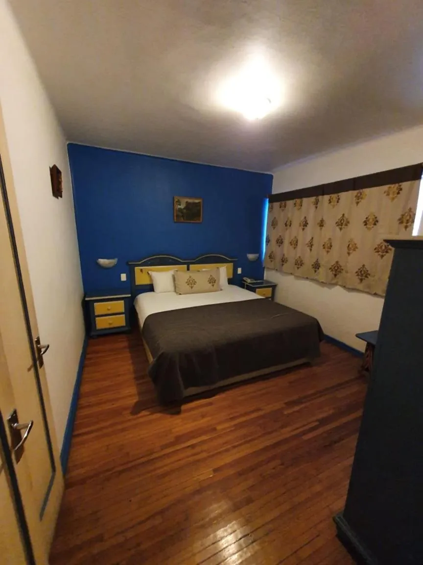 Bed in Hotel Residencia Polanco
