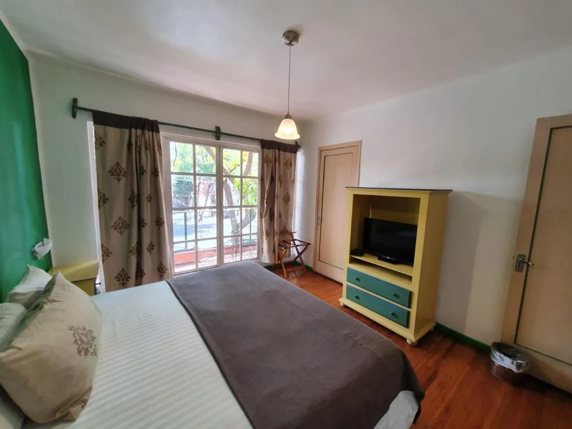 Bed in Hotel Residencia Polanco